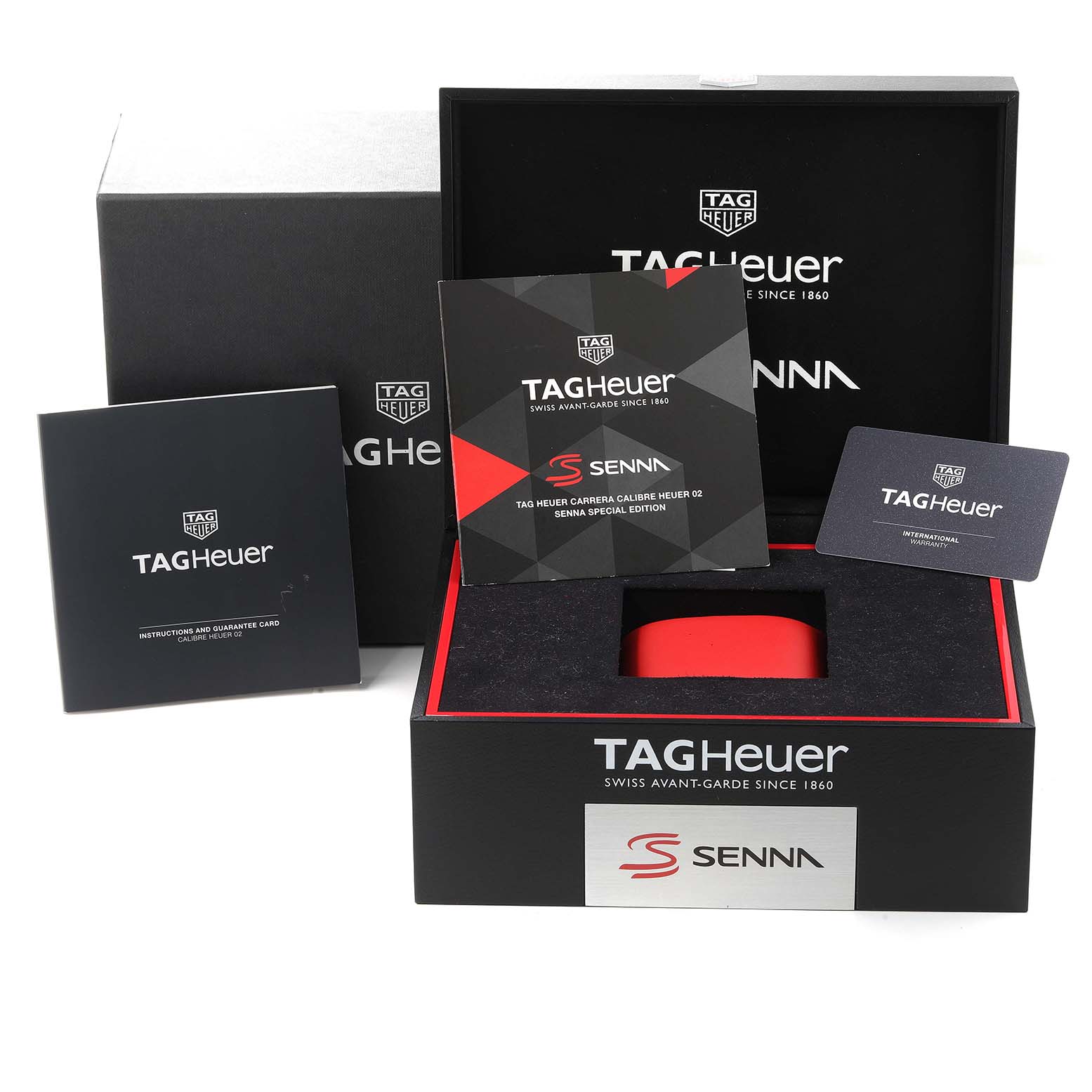 This image shows the packaging and documentation for a Tag Heuer Carrera CBG2013.BA0657 Men's Stainless Steel Black Dial CBG2013.BA0657 Men's Stainless Steel Black Dial watch, including a box, booklets, and warranty card.