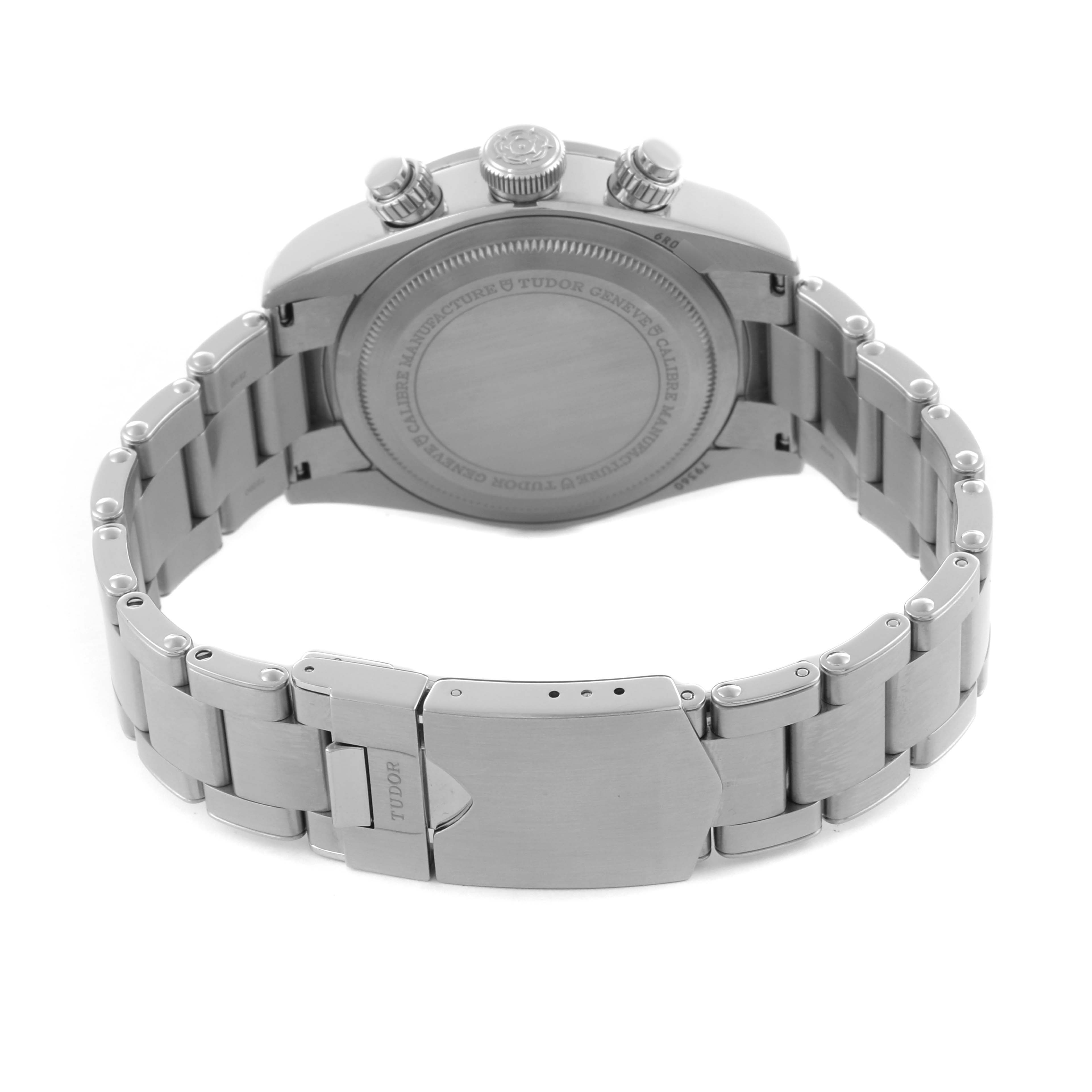 The image shows the back and bracelet clasp of the Tudor Heritage Chrono 79360N-0001 Men's Stainless Steel Black Dial 79360N-0001 Men's Stainless Steel Black Dial watch, highlighting the case back and metal links.