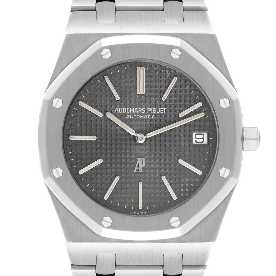 The Audemars Piguet Royal Oak watch is shown from the front, highlighting the dial, bezel, and part of the bracelet.