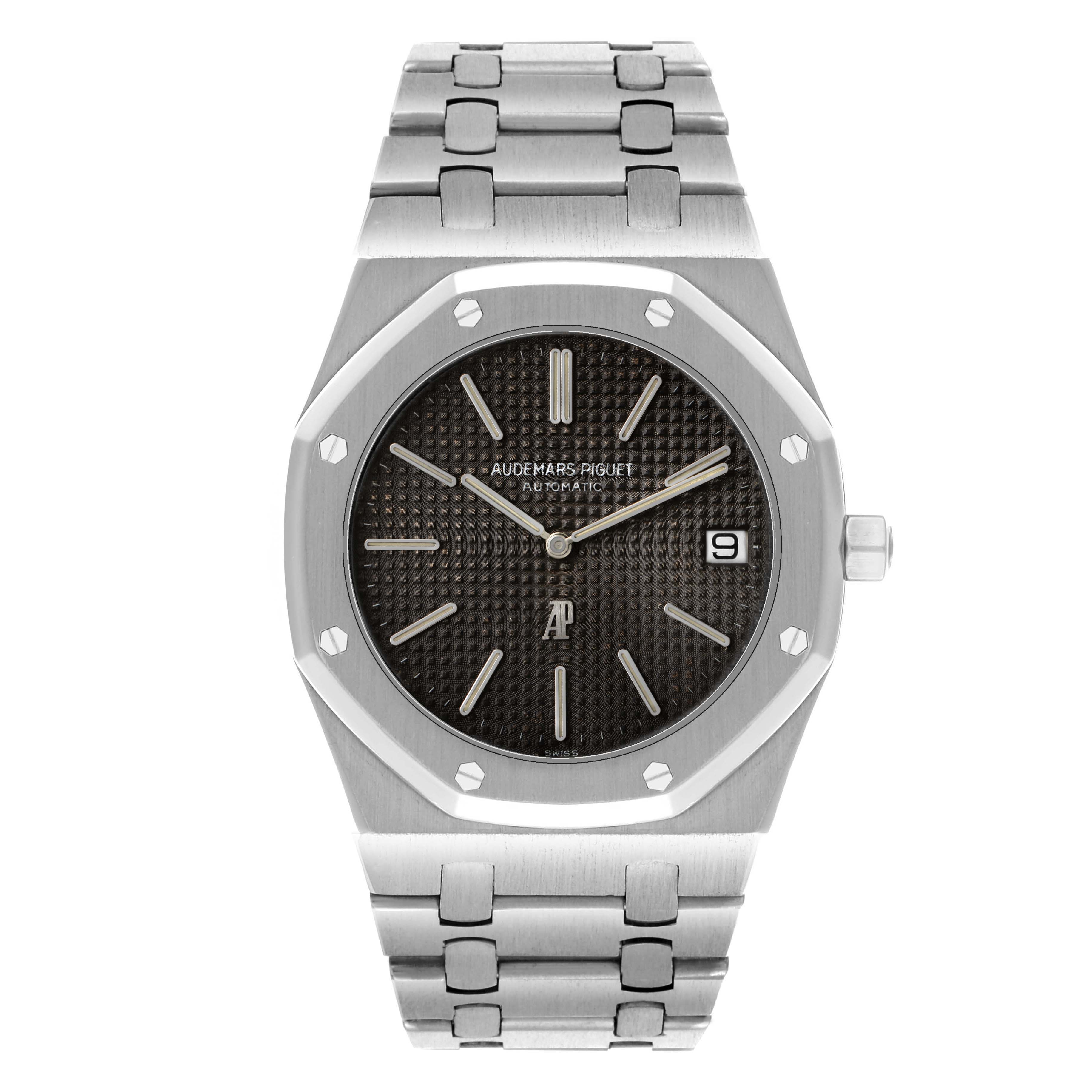 The Audemars Piguet Royal Oak 5402ST Men's Stainless Steel Black Dial watch is shown from a top-down angle, displaying the dial, bezel, bracelet, and crown.