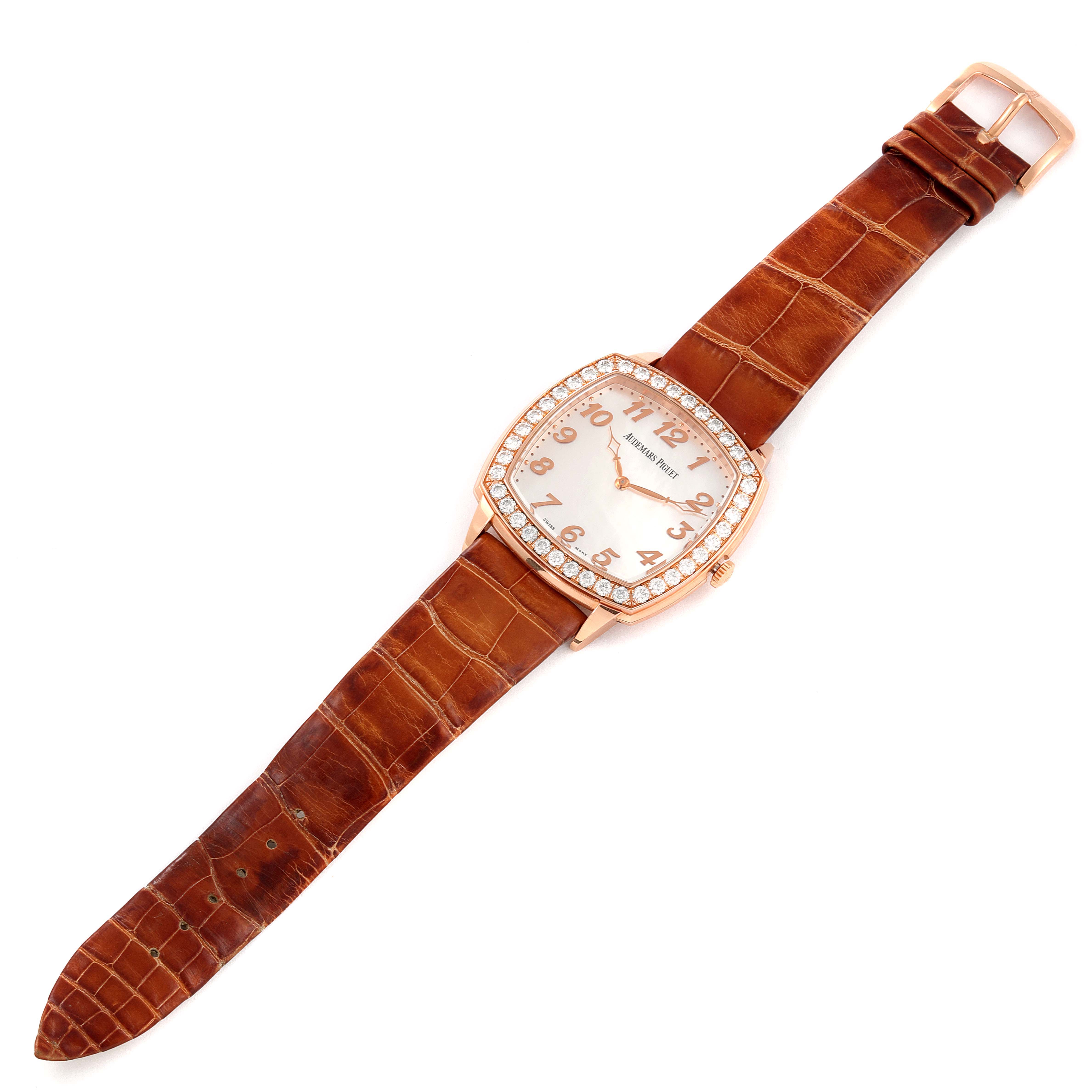 This image shows a top-down view of a Vintage Audemars Piguet watch with a brown leather strap and diamond-encrusted bezel.