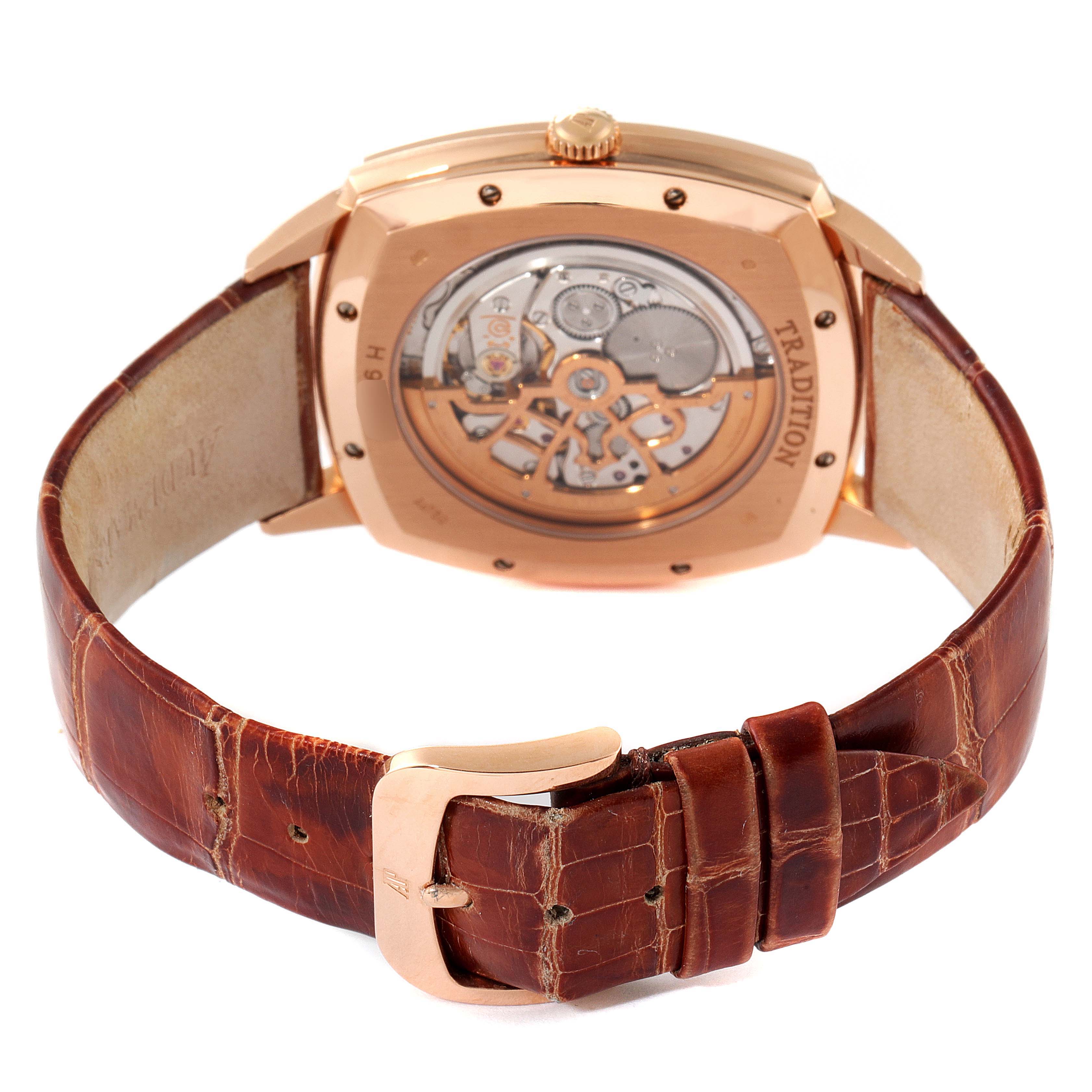 The image shows the back of the Vintage model Audemars Piguet watch, featuring its transparent case back and leather strap.