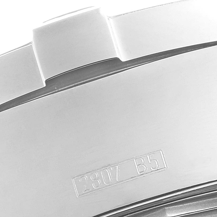 The image shows a close-up of the case back edge and bezel of the Breitling Superocean A13340 Men's Stainless Steel Blue Dial A13340 Men's Stainless Steel Blue Dial watch, with part of a serial number visible.