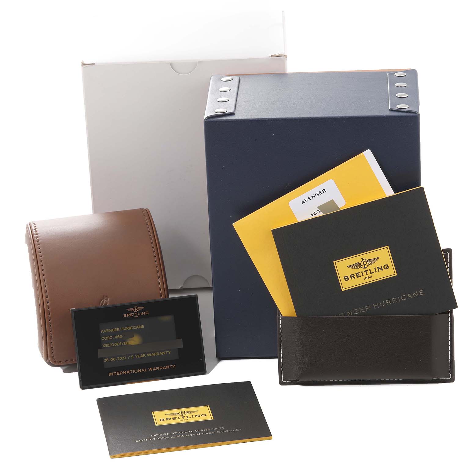The image shows the packaging and accessories for a Breitling Avenger XB1210E4/BE89 Men's Titanium Black Dial XB1210E4/BE89 Men's Titanium Black Dial watch, including the box, warranty card, booklet, and a leather pouch.