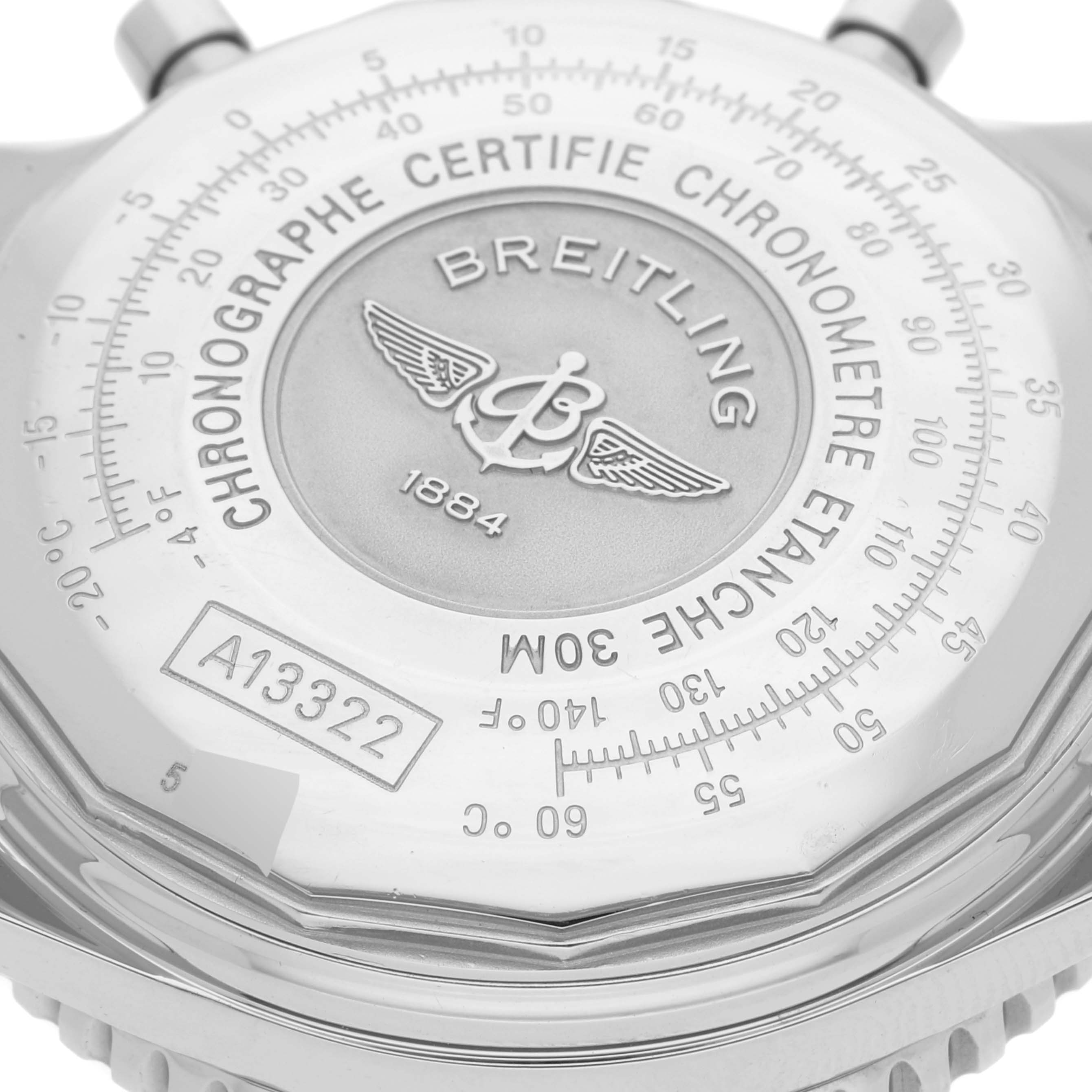 This image shows the back case of a Breitling Navitimer A13322 Men
s Stainless Steel Blue Dial A13322 Men
s Stainless Steel Blue Dial watch with engraving and markings.