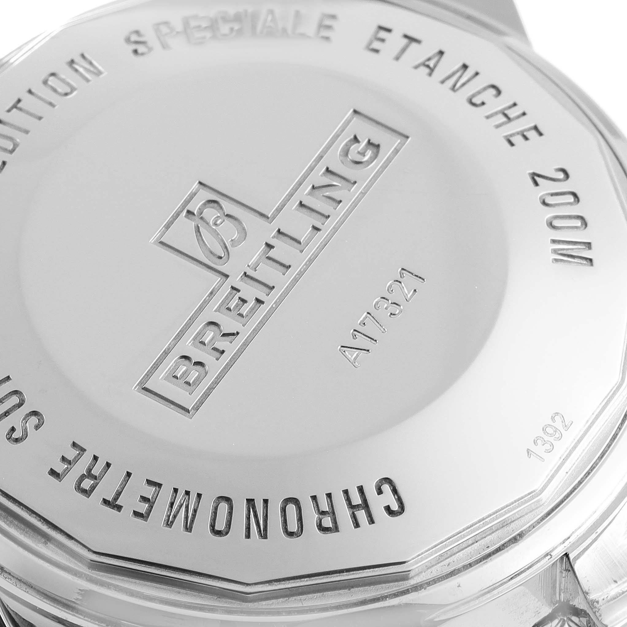 This image shows the back case of a Breitling Superocean A17321 Men's Stainless Steel Silver Dial A17321 Men's Stainless Steel Silver Dial watch, focusing on its engravings and details.
