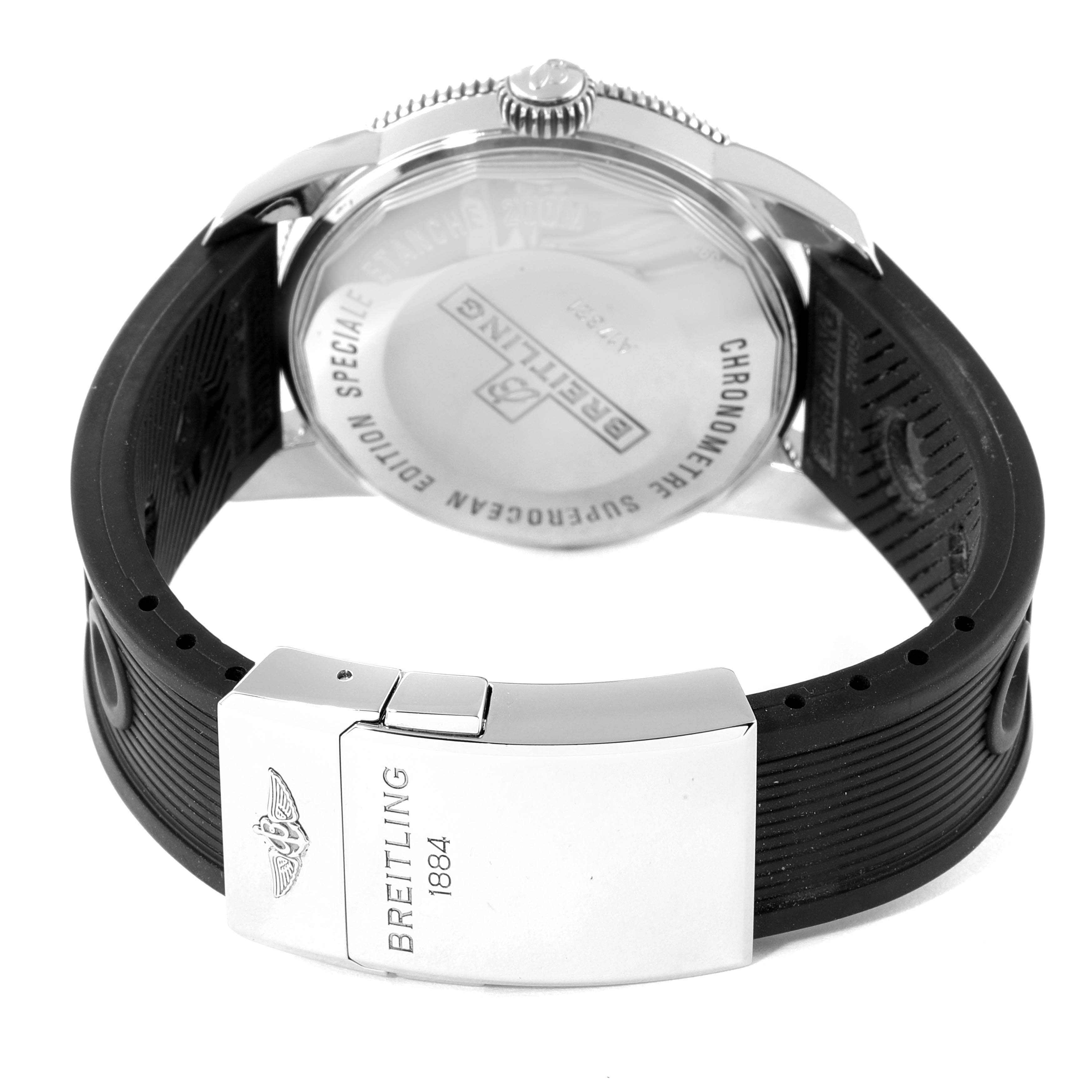 The image shows the back of a Breitling Superocean A17321 Men's Stainless Steel Silver Dial A17321 Men's Stainless Steel Silver Dial watch at a rear angle, highlighting the case back and clasp of the rubber strap.