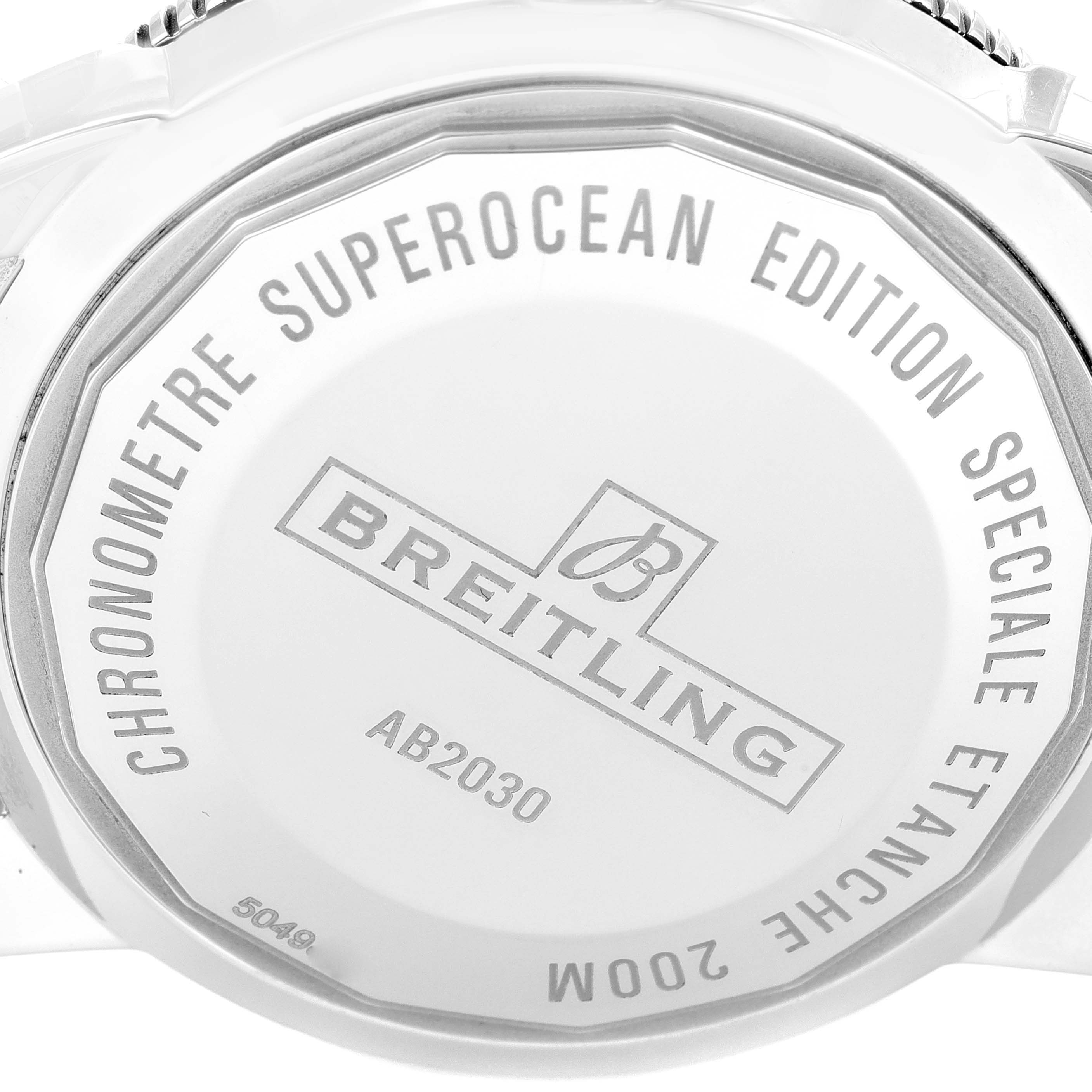 The image shows the backside of the Breitling Superocean AB2030 Men's Stainless Steel Black Dial AB2030 Men's Stainless Steel Black Dial watch, highlighting the engraved details and model number AB2030.