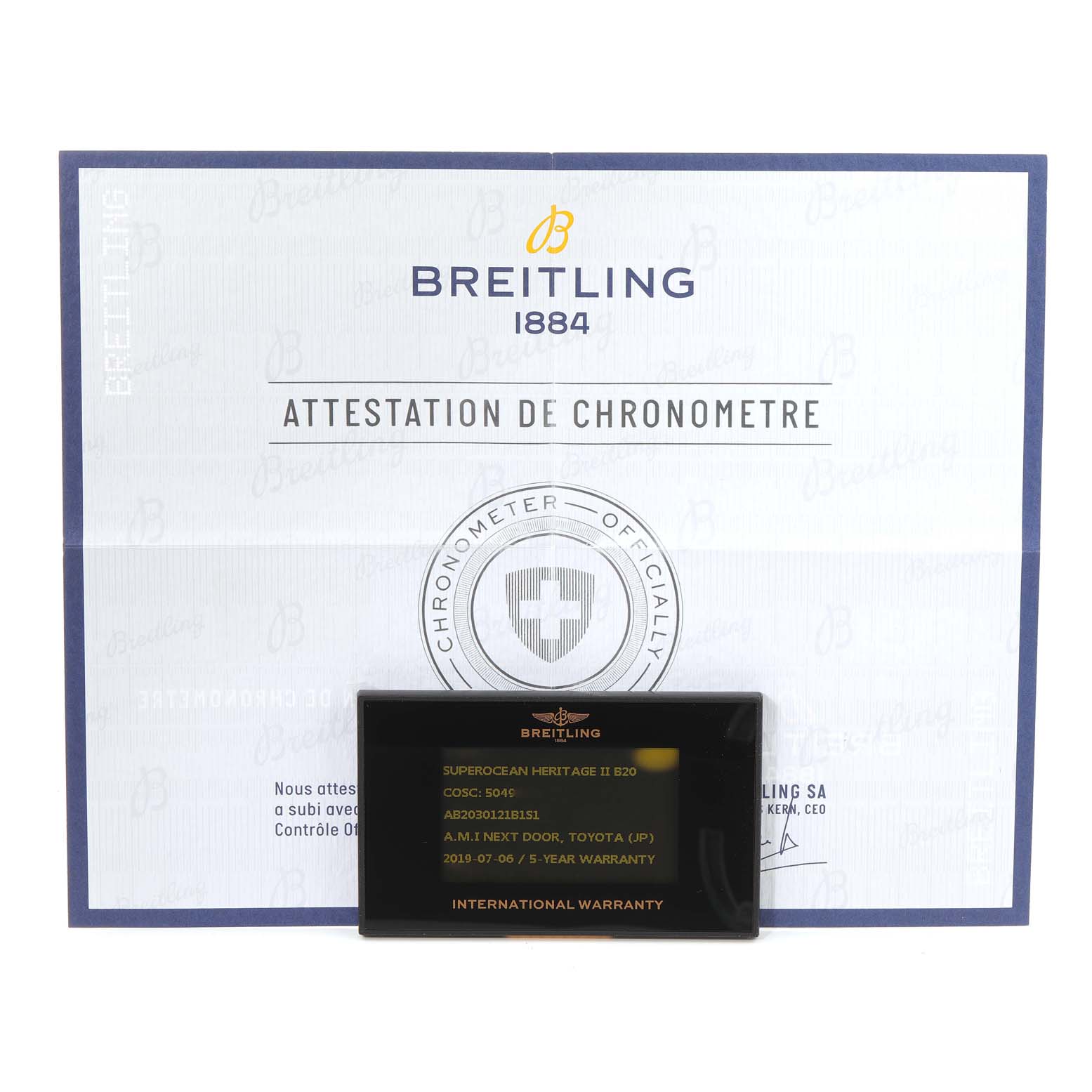 The image shows the warranty card and certificate for a Breitling Superocean AB2030 Men's Stainless Steel Black Dial AB2030 Men's Stainless Steel Black Dial model, viewed from a straight-on angle.