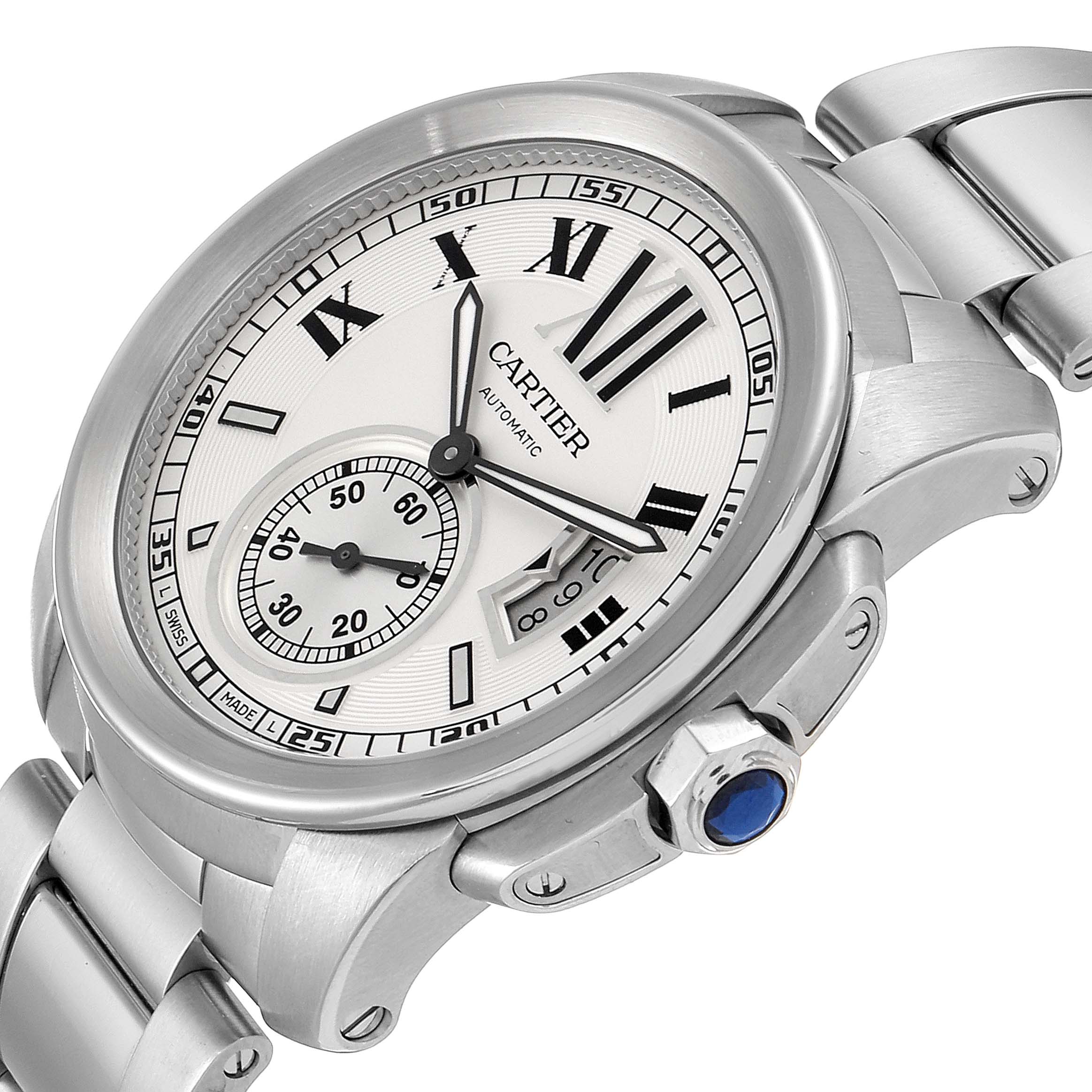 The image shows a close-up of the face and bracelet of a Calibre de Cartier watch by Cartier, highlighting its silver dial and Roman numerals.