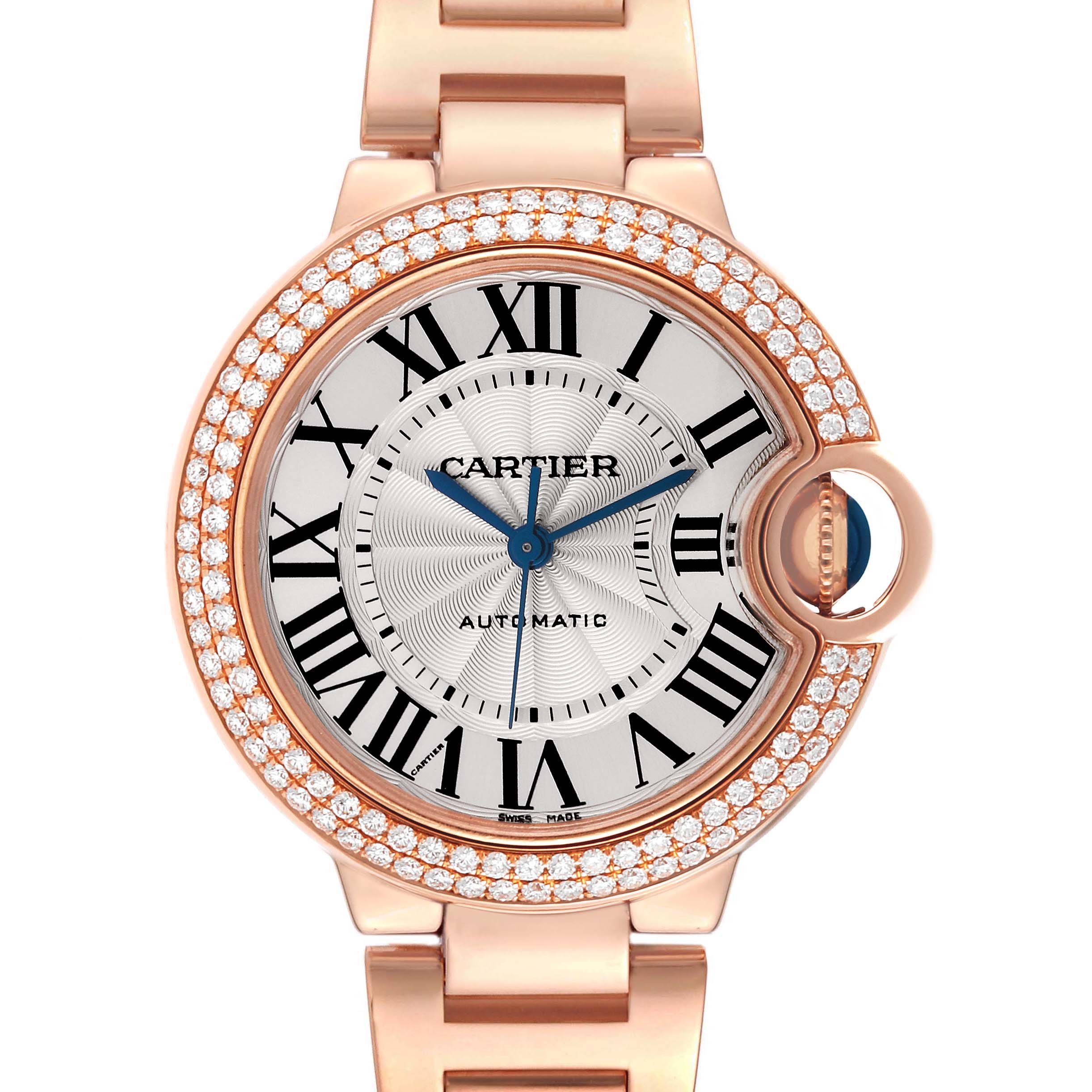 The Cartier Ballon Bleu WE902064 Men
s Rose Gold Silver Dial WE902064 Men
s Rose Gold Silver Dial watch is shown from a frontal angle, highlighting the face, Roman numerals, and diamond-set bezel.