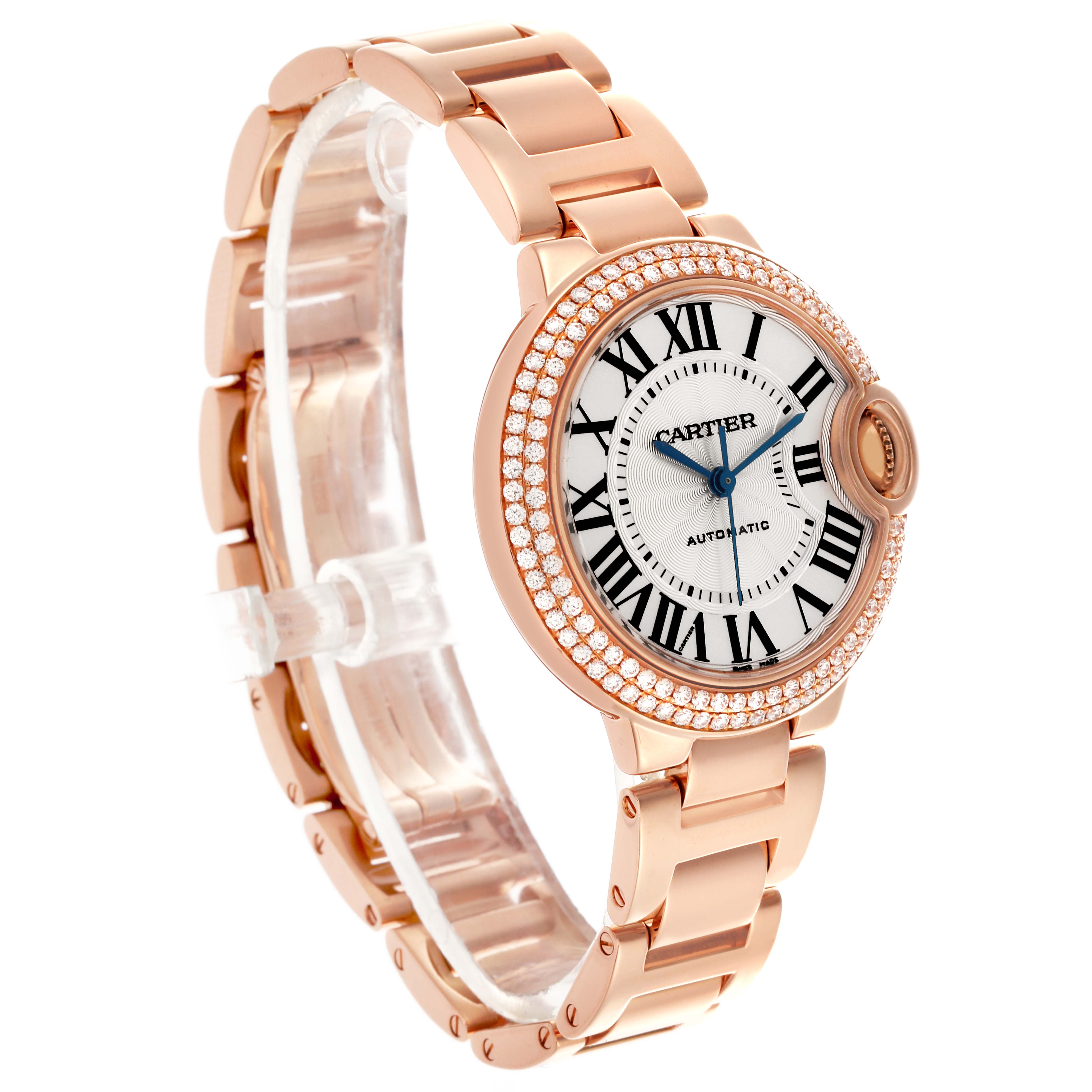 The Cartier Ballon Bleu WE902064 Men
s Rose Gold Silver Dial WE902064 Men
s Rose Gold Silver Dial watch is shown at an angled side view, displaying its bracelet and detailed dial.