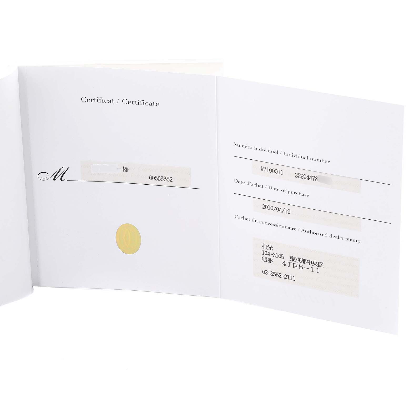 This image shows the certificate and warranty booklet for a Calibre de Cartier watch by Cartier.