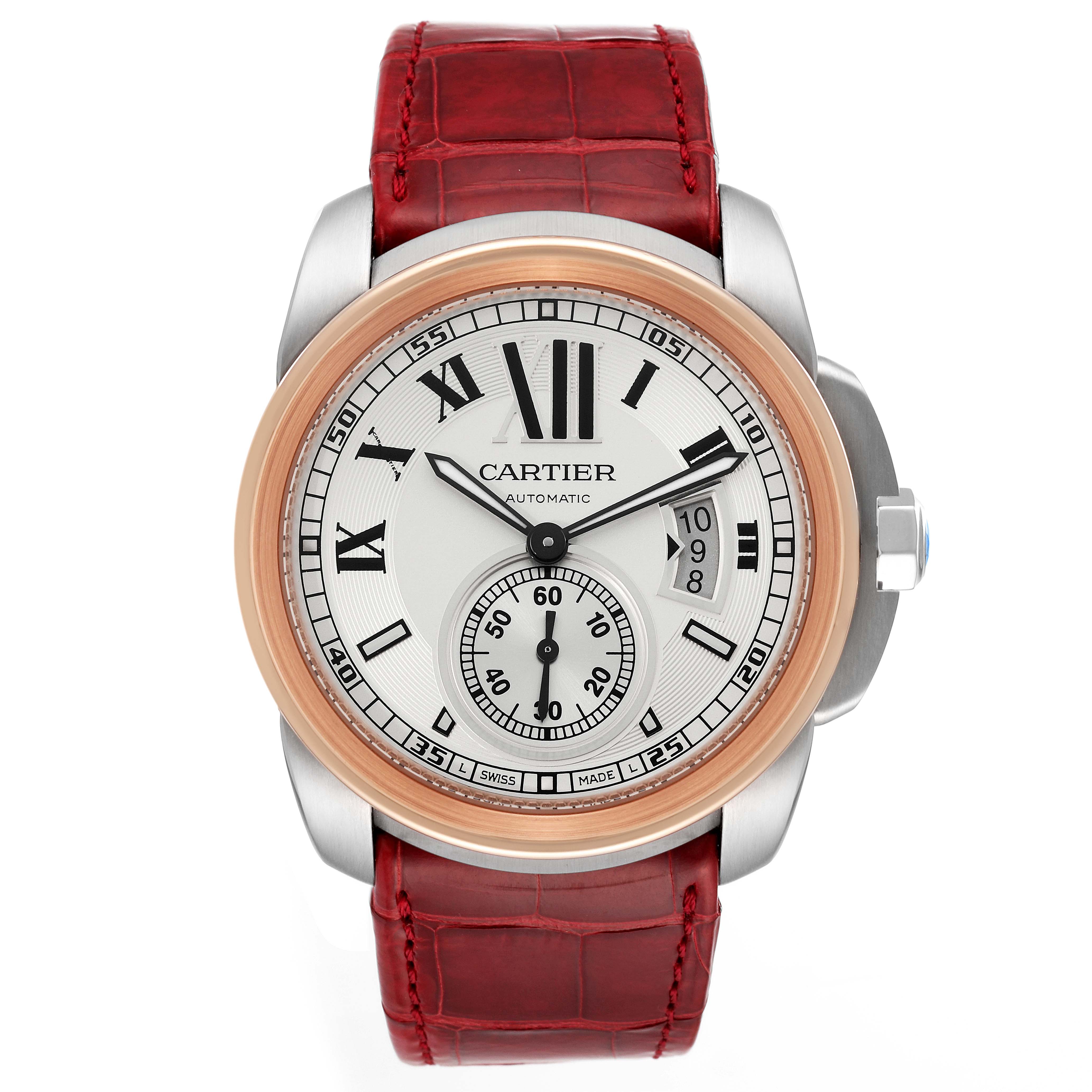 This is a front view of the Calibre de Cartier watch by Cartier, showing its dial, bezel, and leather strap.