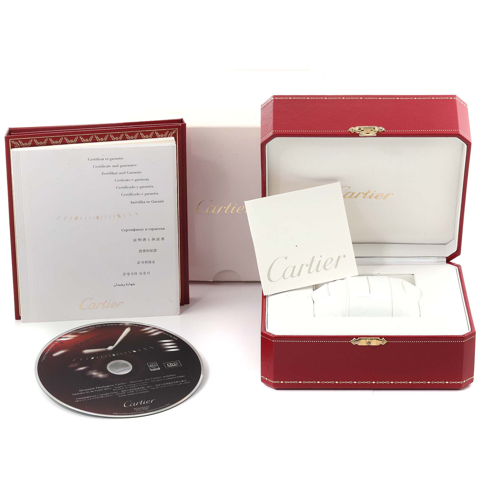 The image shows the packaging, warranty booklet, disc, and box for the Calibre de Cartier model by Cartier.