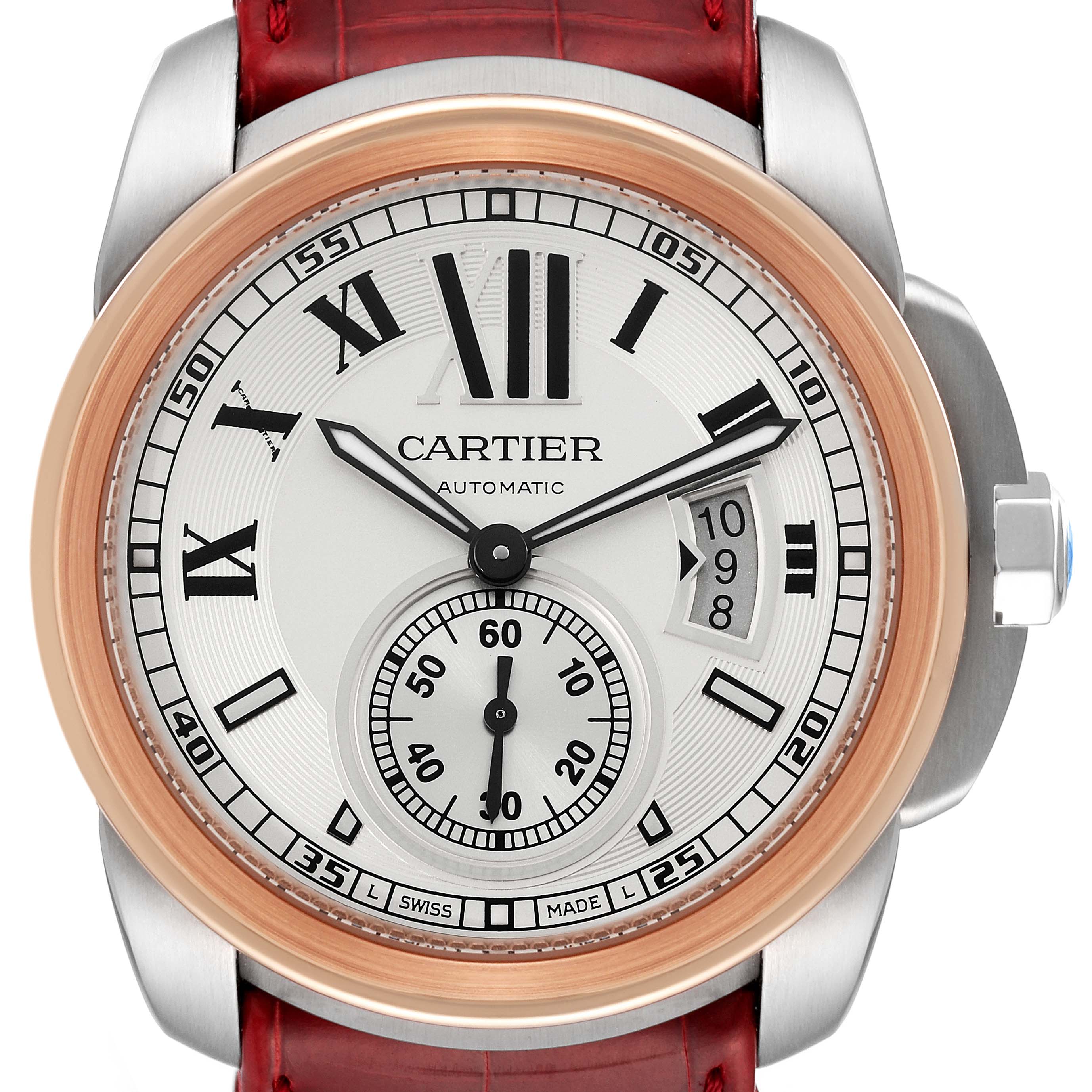 This image shows a front view of the Calibre de Cartier model by Cartier, highlighting its dial, bezel, and part of the strap.