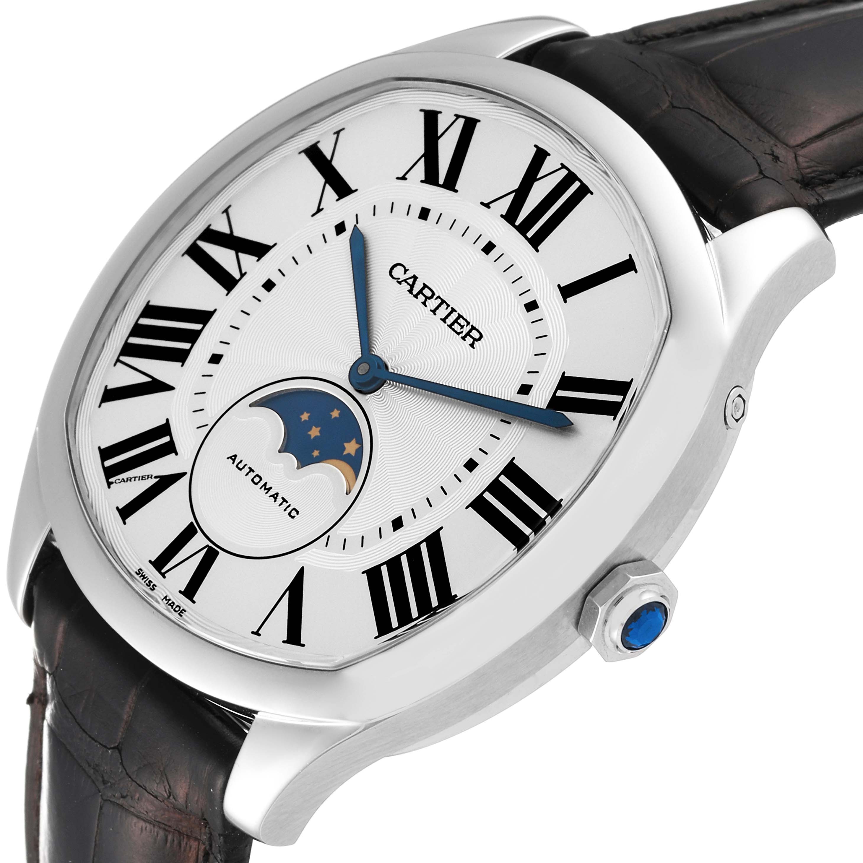 The Drive de Cartier watch by Cartier is shown from an oblique angle, highlighting its face, hands, moon phase indicator, and crown.