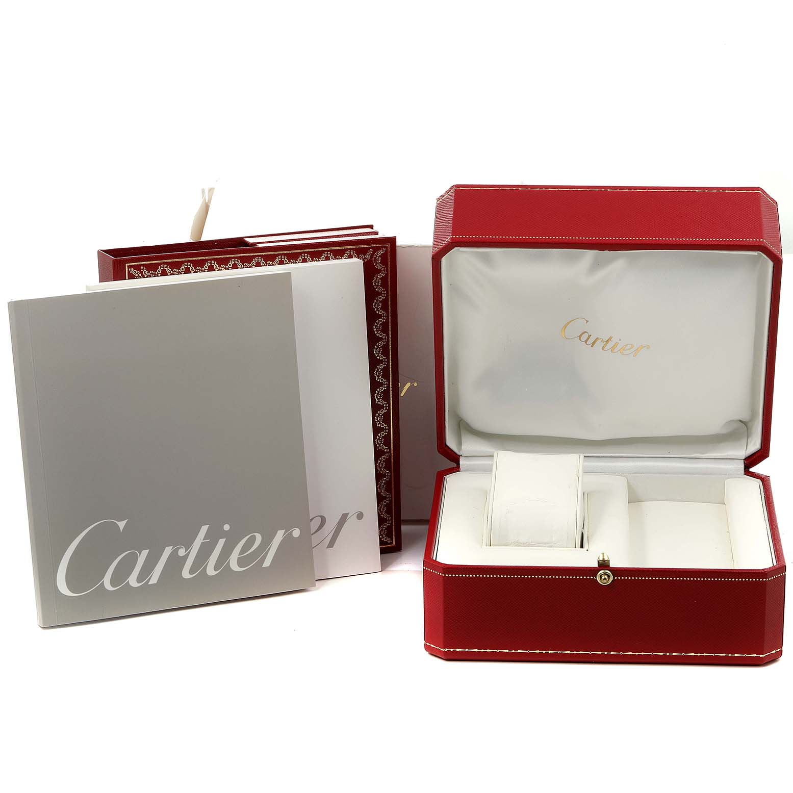 The image shows the packaging and accessories of a Cartier Roadster W62016V3 Women's Stainless Steel Silver Dial W62016V3 Women's Stainless Steel Silver Dial watch, including an open red box, a manual, and papers.
