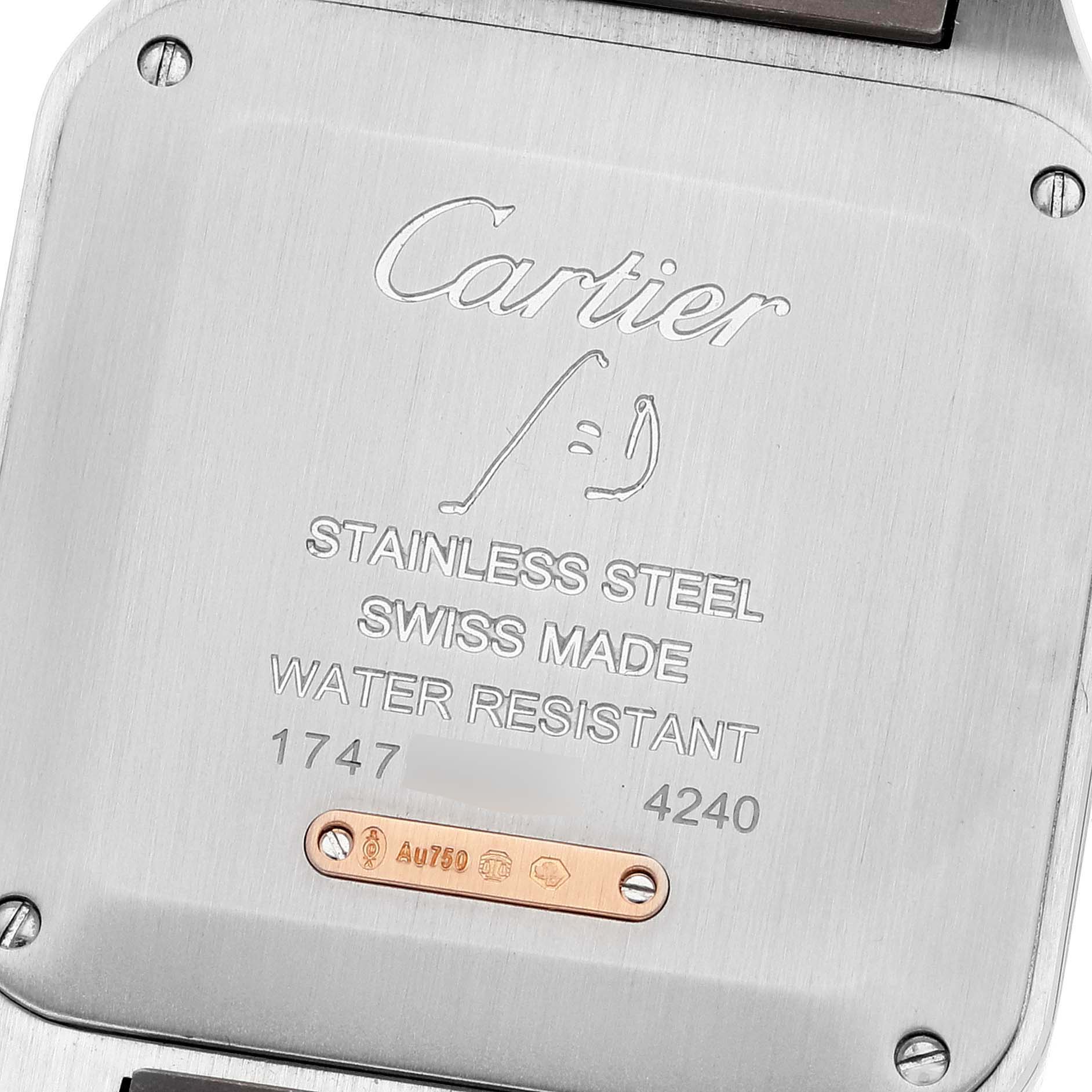 This image shows the backplate of the Cartier Santos Dumont W2SA0011 Men's Steel and Gold (two tone) Silver Dial W2SA0011 Men's Steel and Gold (two tone) Silver Dial watch, highlighting the stainless steel construction and inscriptions.