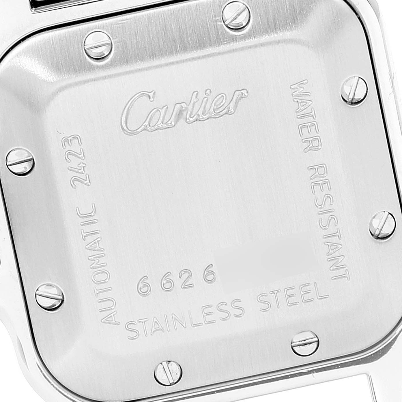 This image shows the stainless steel case back of a Cartier Santos W20044D6 Women's Stainless Steel Silver Dial W20044D6 Women's Stainless Steel Silver Dial watch with screws and engraved details.