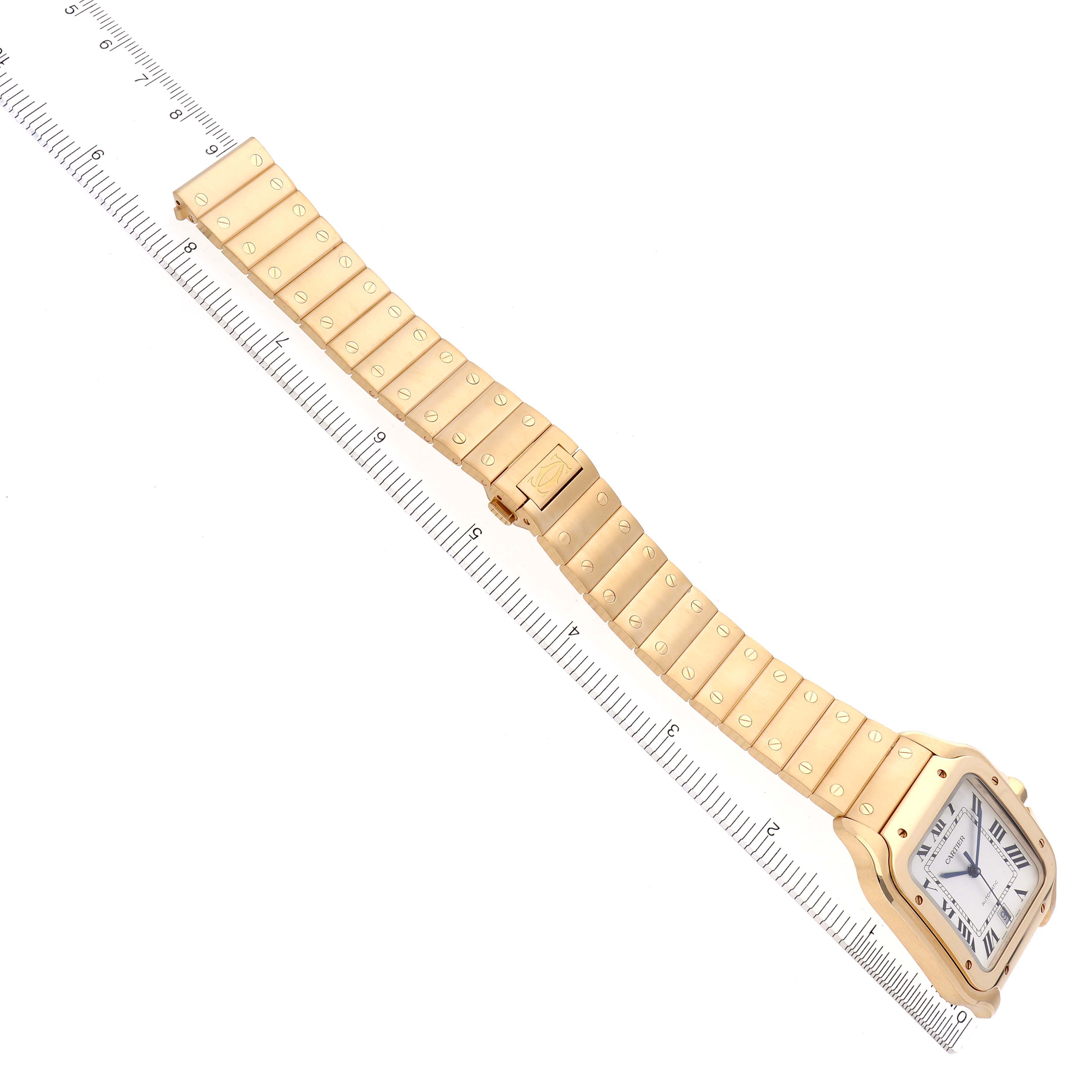 The Cartier Santos WGSA029 Men's Yellow Gold Silver Dial WGSA029 Men's Yellow Gold Silver Dial watch is shown at an angled top view, highlighting the dial and full bracelet length.