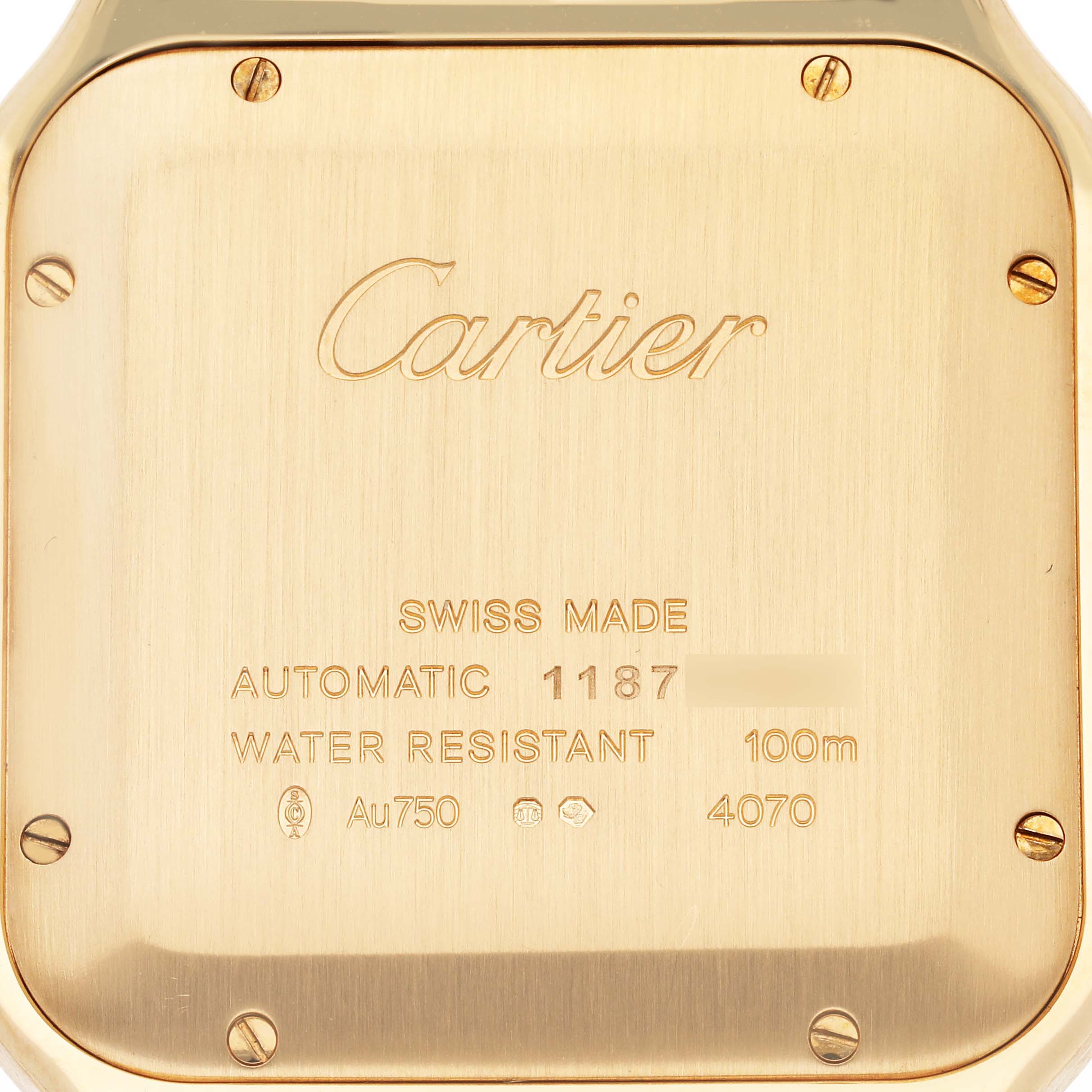 The image shows the back case of the Cartier Santos WGSA029 Men's Yellow Gold Silver Dial WGSA029 Men's Yellow Gold Silver Dial watch, displaying engraving details.