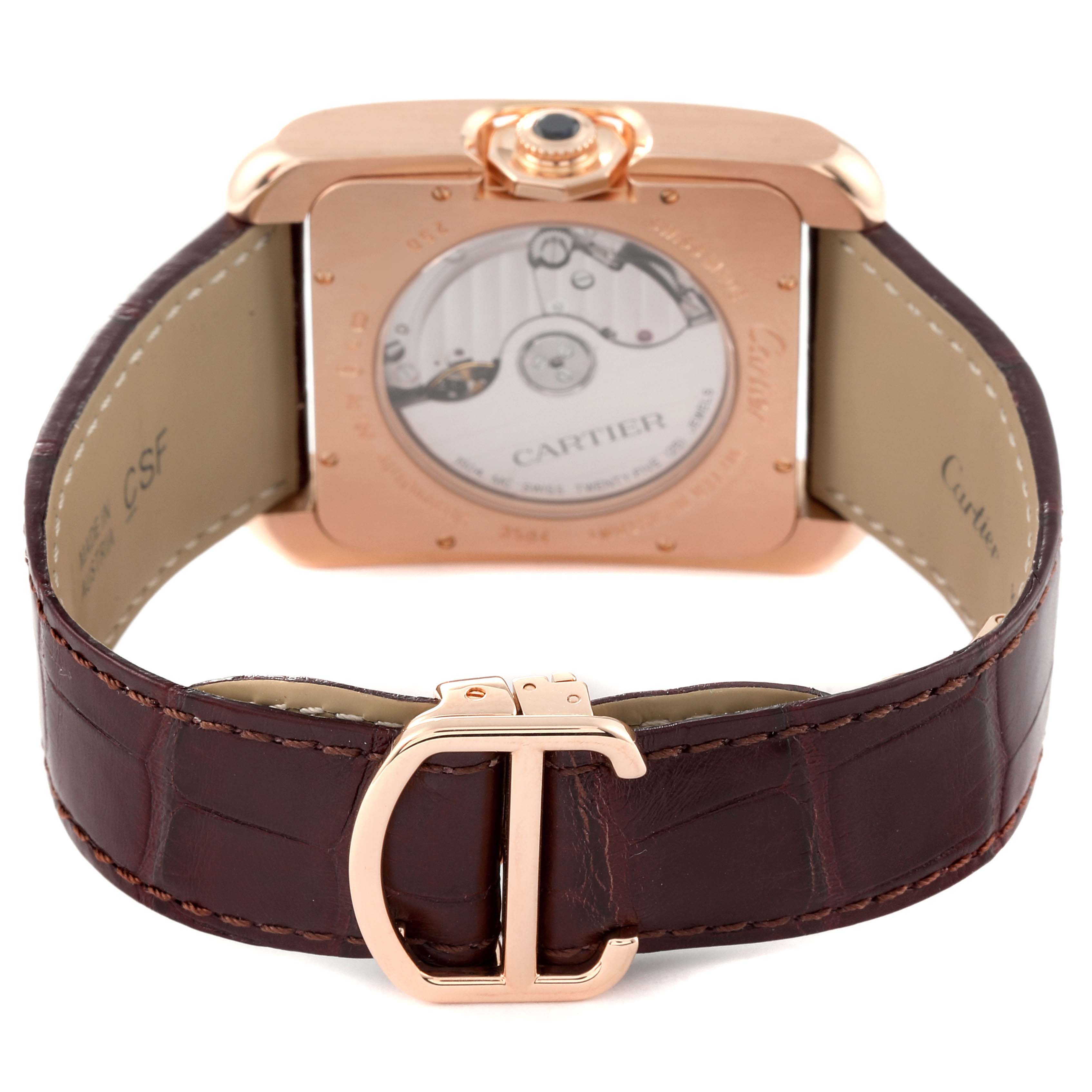 The image shows the back view of the Cartier Tank Anglaise W5310004 Men's Rose Gold Silver Dial W5310004 Men's Rose Gold Silver Dial watch and its open brown leather strap with a gold buckle.