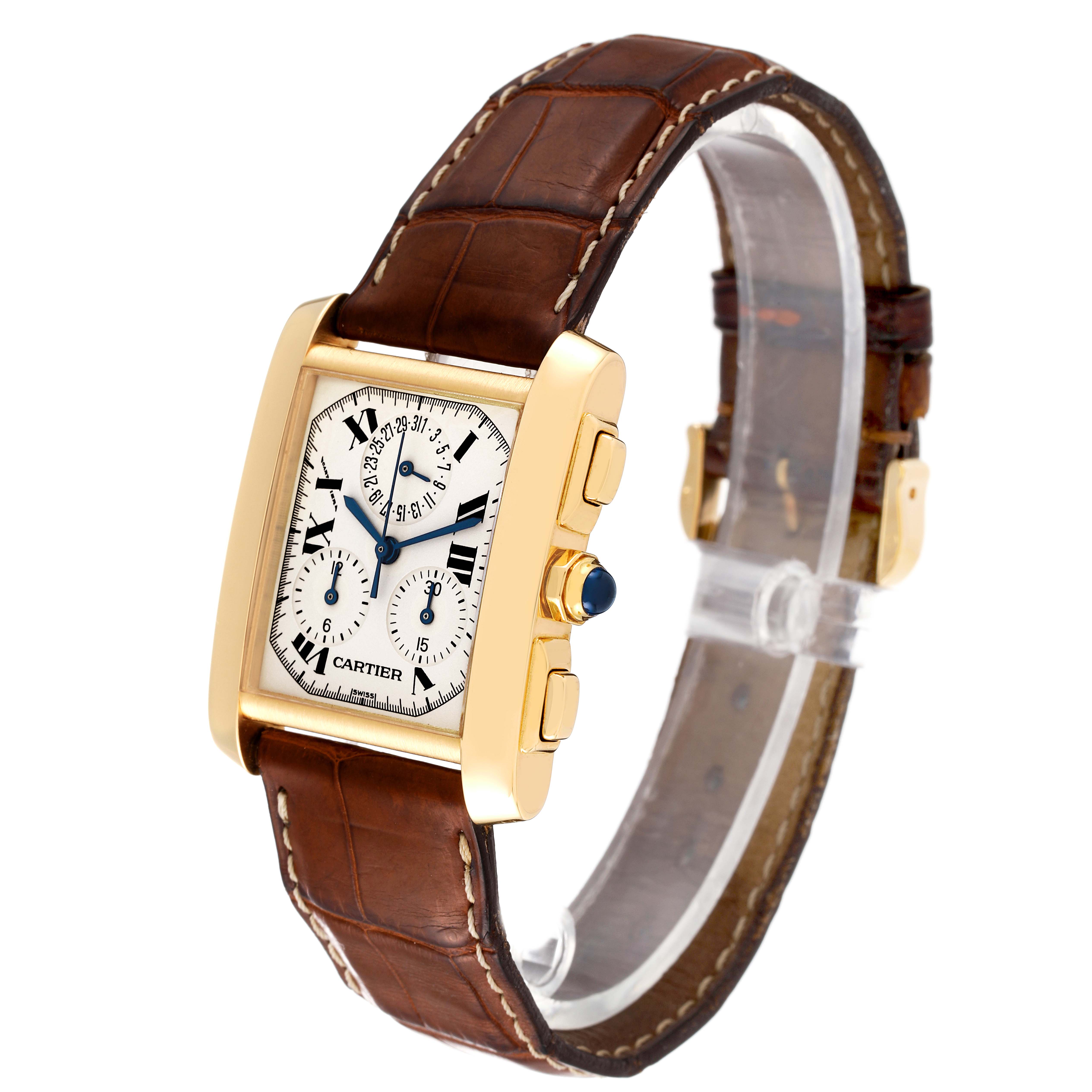 This image shows a Cartier Tank Francaise W5000556 Men's Yellow Gold Silver Dial W5000556 Men's Yellow Gold Silver Dial watch angled to display the face, side buttons, and brown leather strap.