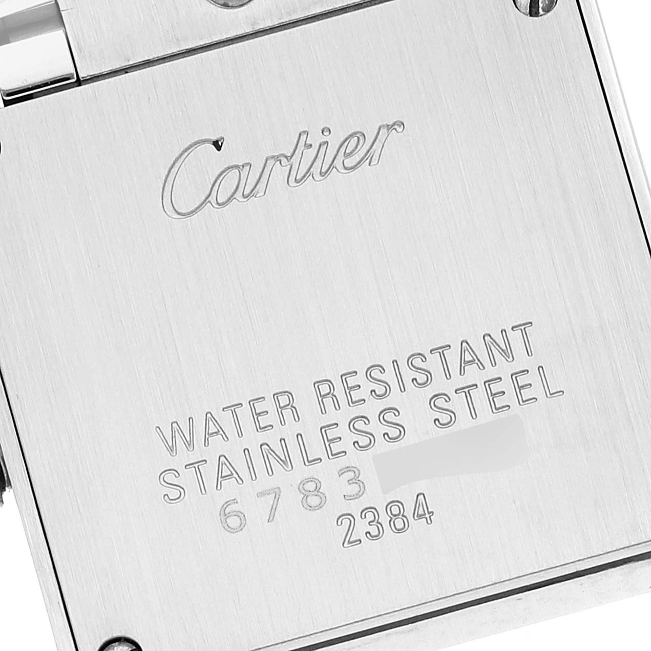 This image shows the back case of a Cartier Tank Française watch, highlighting the engraved brand name and water resistance information.