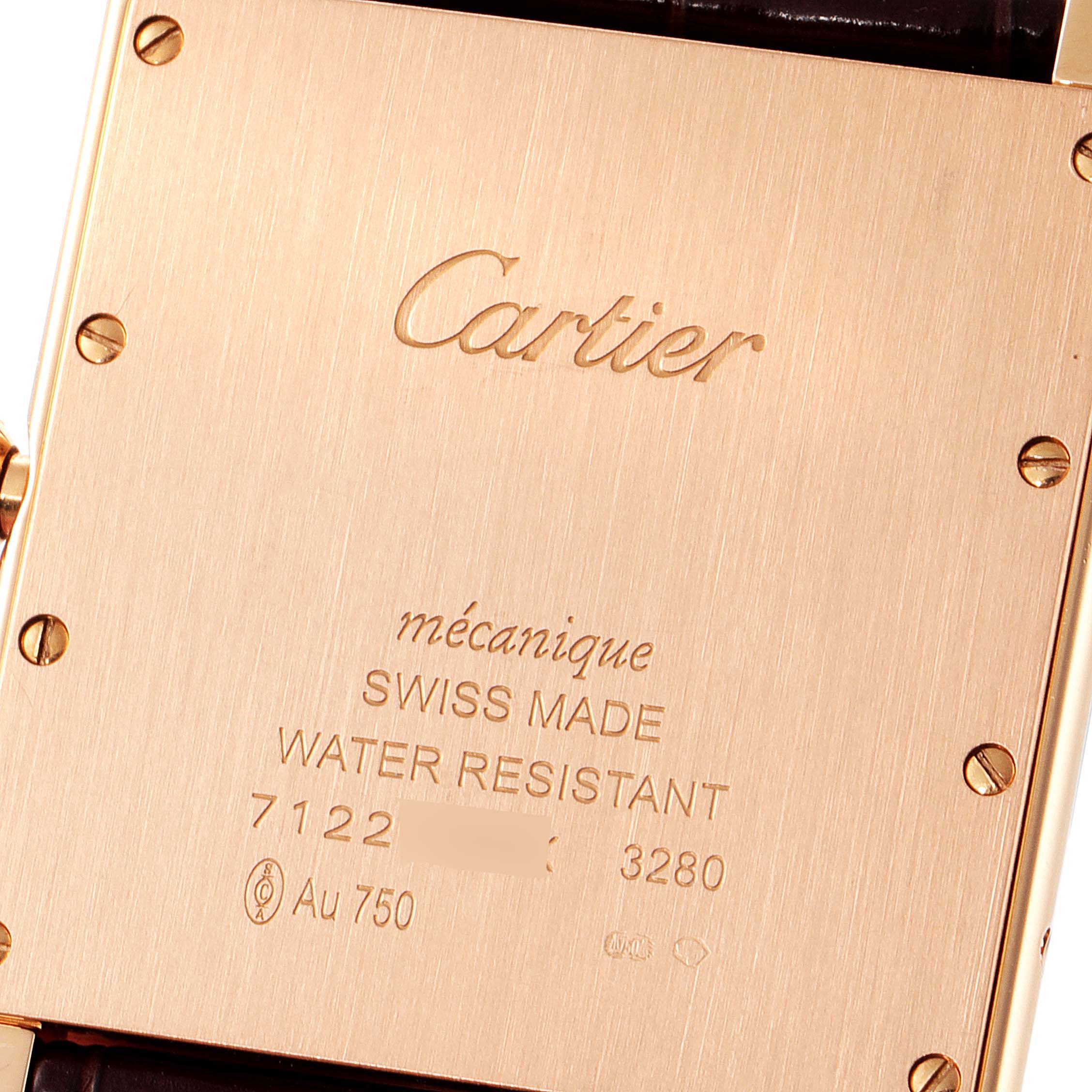 The image shows the back view of a Cartier Tank Louis W1560017 Men's Rose Gold Silver Dial W1560017 Men's Rose Gold Silver Dial watch with engravings and screws.