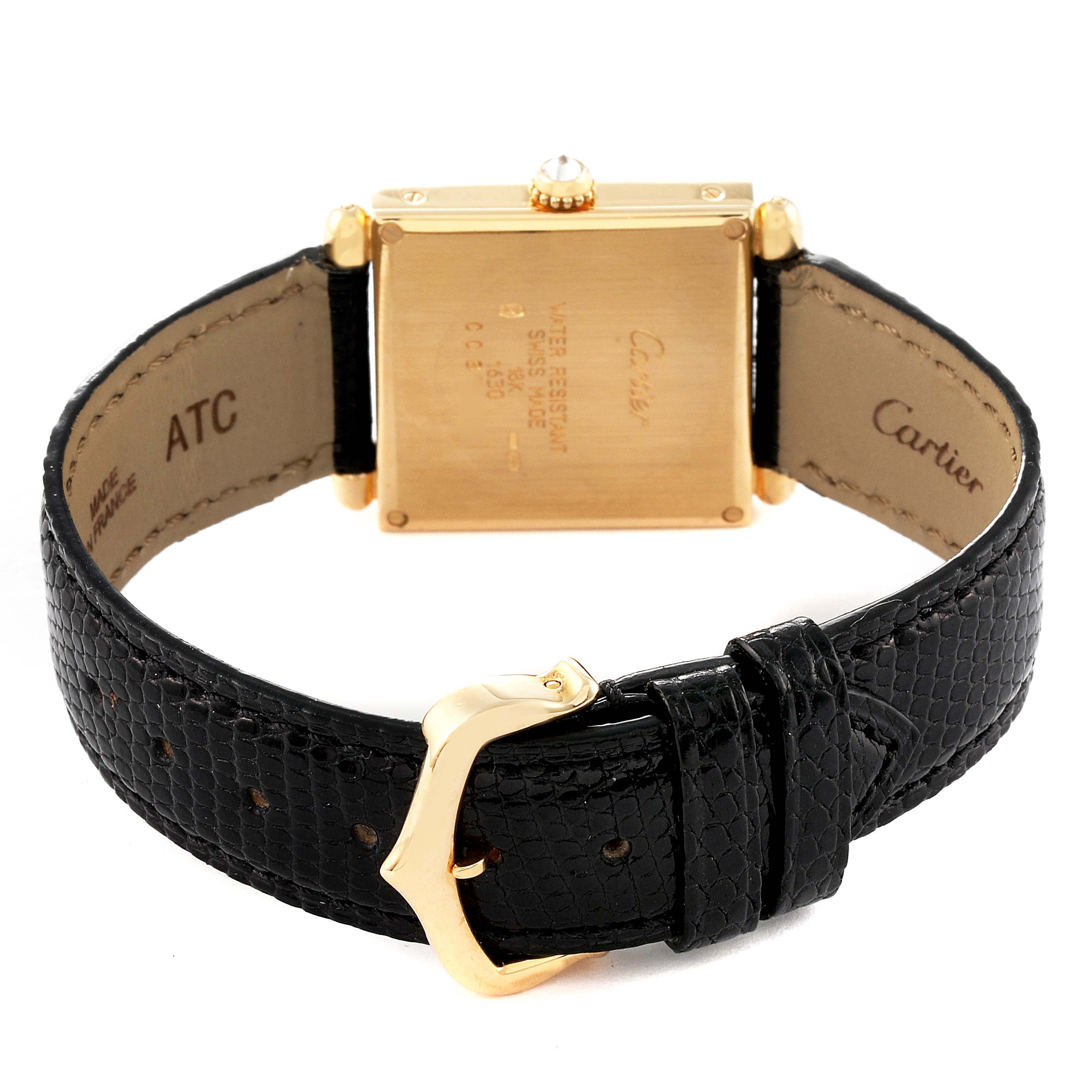 The image shows the back view of a Cartier Tank Obus WB800351 Women
s Yellow Gold Silver Dial WB800351 Women
s Yellow Gold Silver Dial watch, highlighting the clasp, straps, and caseback.