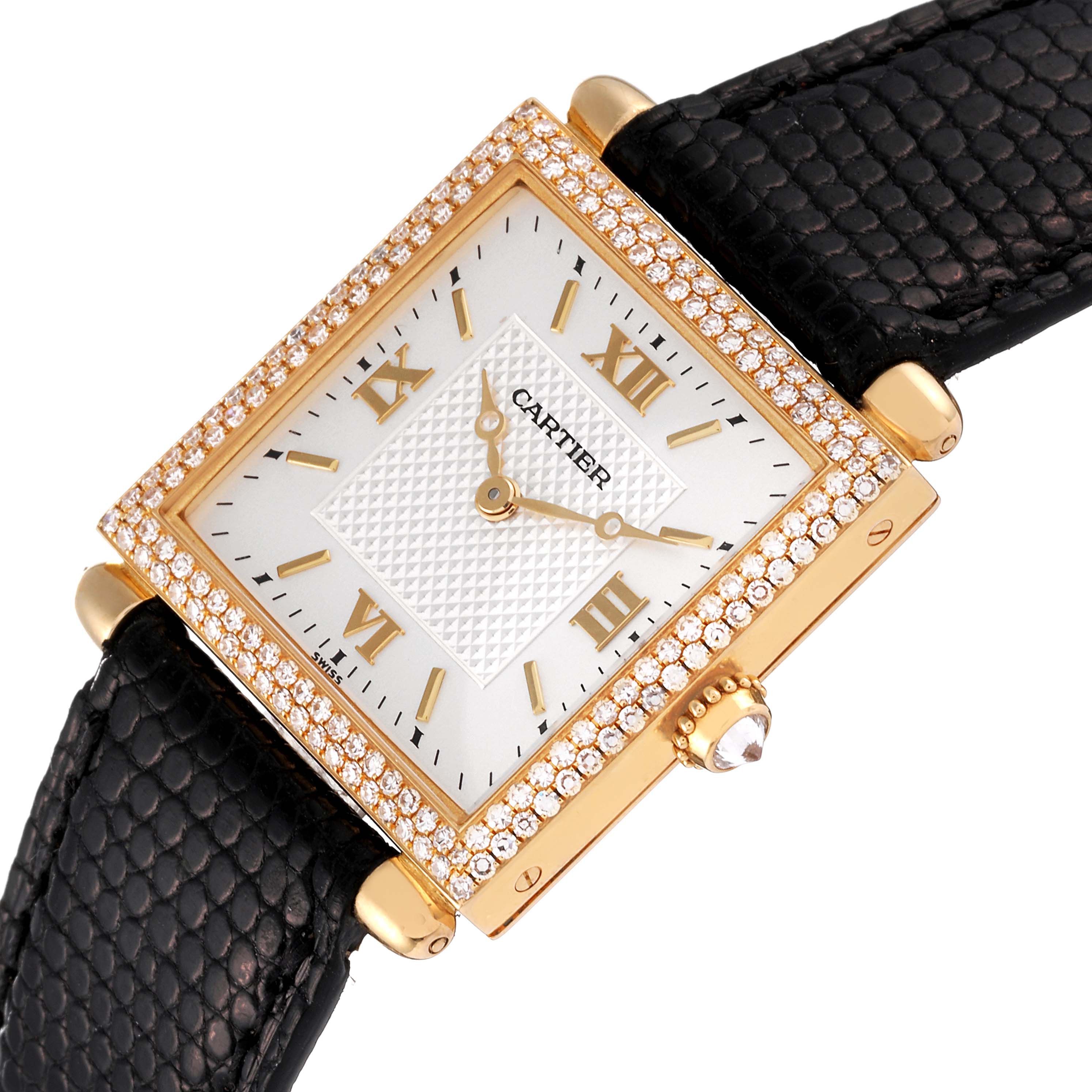 The image shows a Cartier Tank Obus WB800351 Women
s Yellow Gold Silver Dial WB800351 Women
s Yellow Gold Silver Dial model watch from a slightly angled top view, highlighting the face, bezel, strap, and crown.