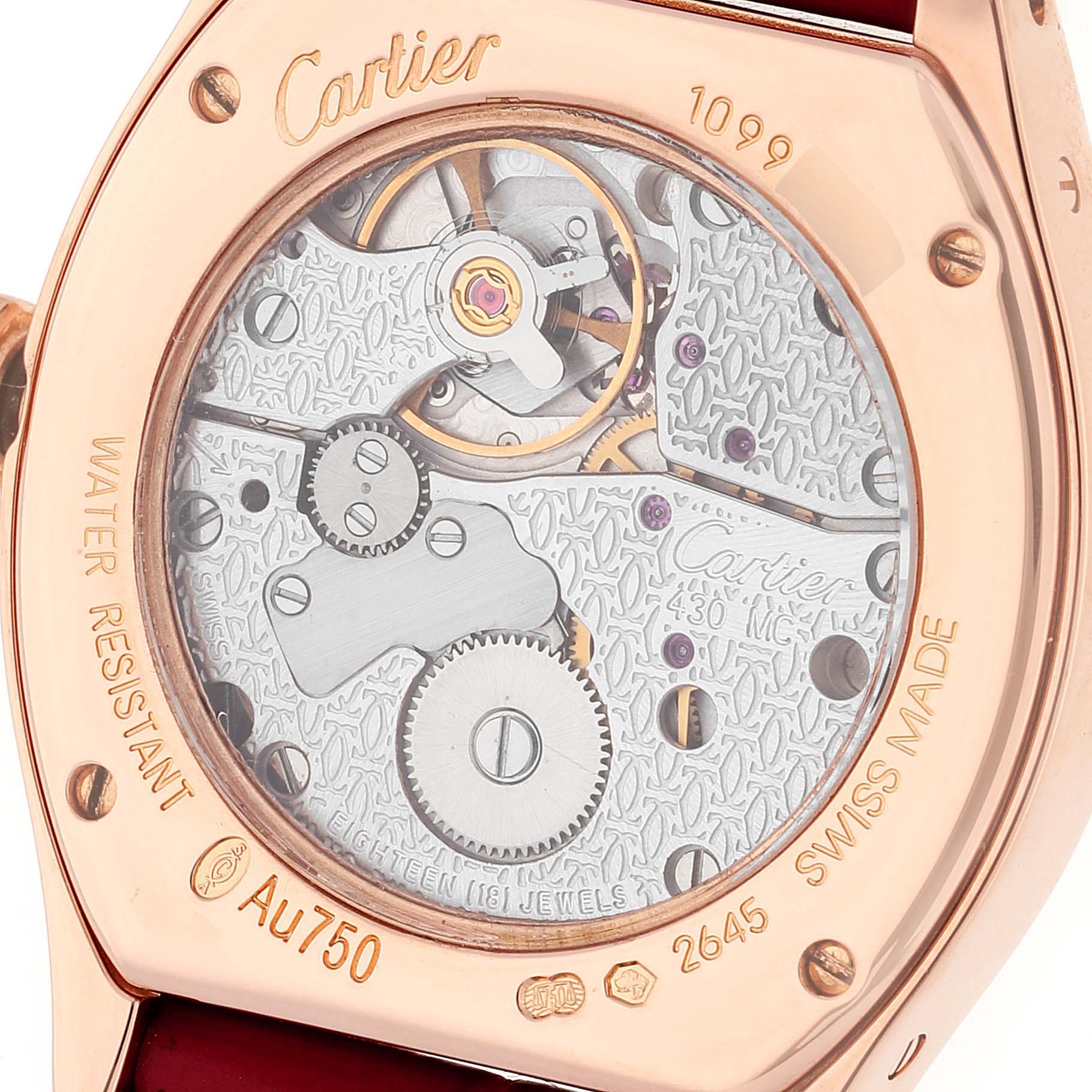 This image shows the back view of a Cartier Tortue WA507031 Women's Rose Gold Silver Dial WA507031 Women's Rose Gold Silver Dial watch, displaying its intricate internal mechanisms and engravings.