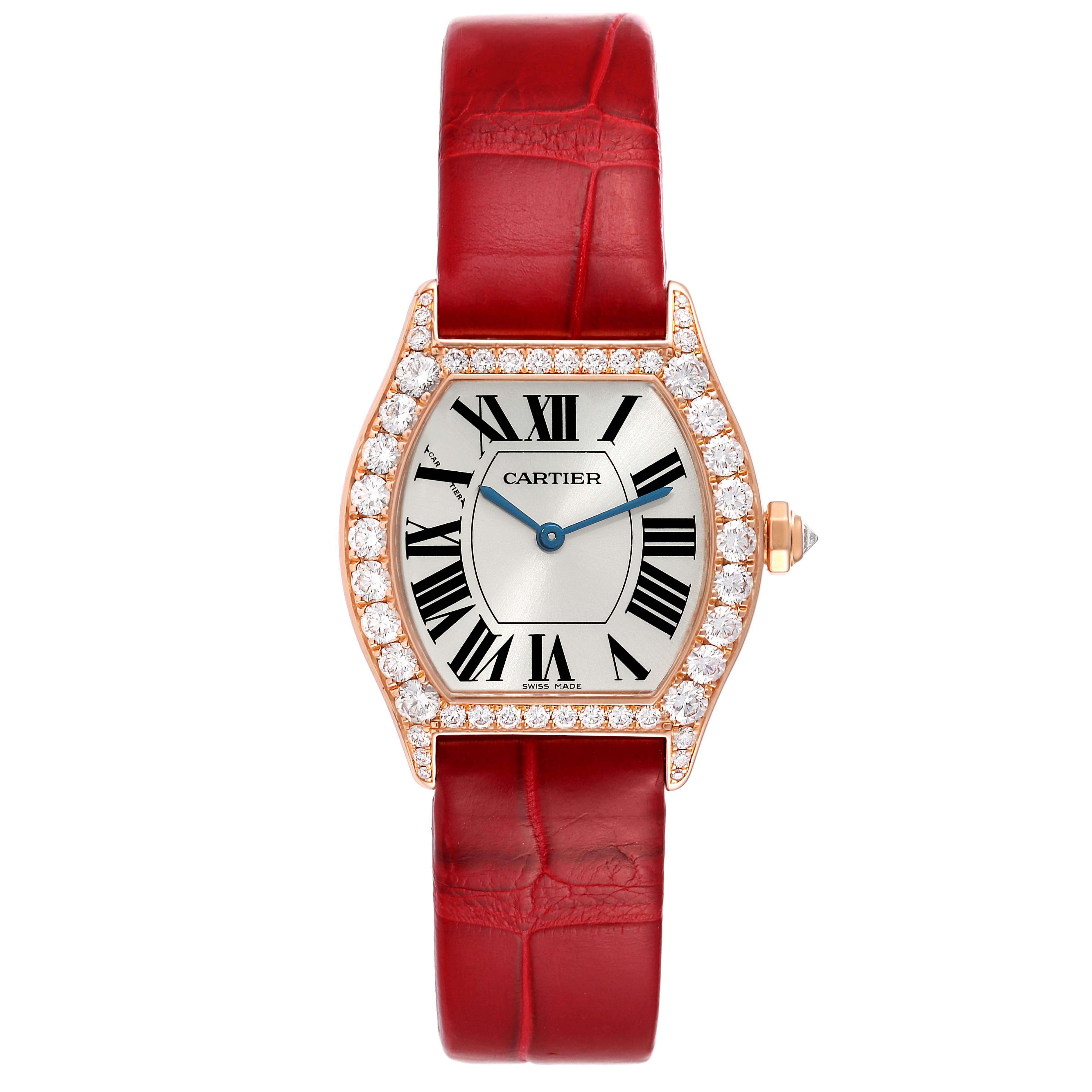 This image shows a front view of the Cartier Tortue WA507031 Women's Rose Gold Silver Dial WA507031 Women's Rose Gold Silver Dial watch with a red leather strap and diamond-studded bezel.