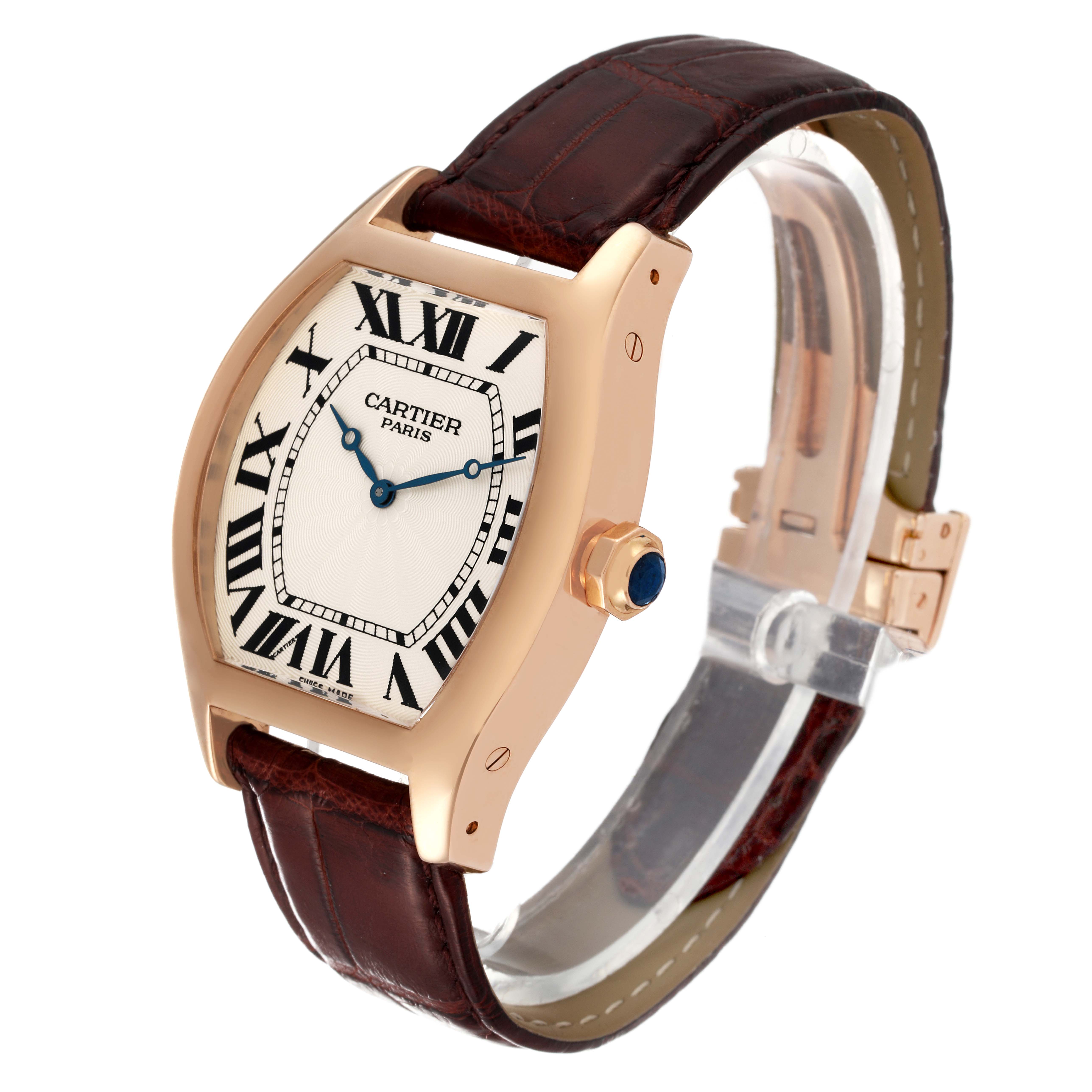 The Cartier Tortue W1546051 Men's Rose Gold Silver Dial W1546051 Men's Rose Gold Silver Dial watch is shown at an angle displaying its face, crown, and leather strap.