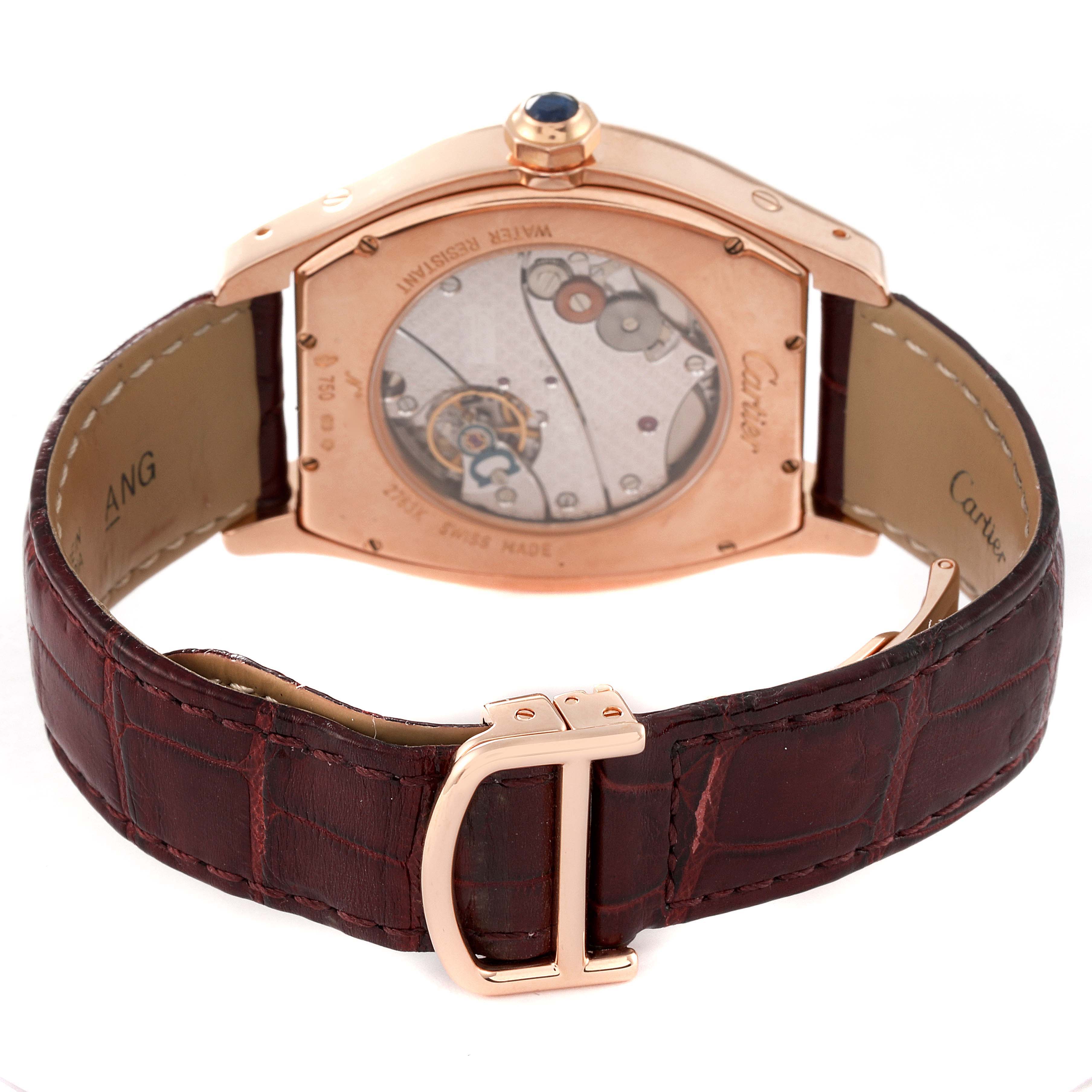 The image shows the back view of the Cartier Tortue W1546051 Men's Rose Gold Silver Dial W1546051 Men's Rose Gold Silver Dial watch, highlighting its mechanical movement and the clasp on the leather strap.