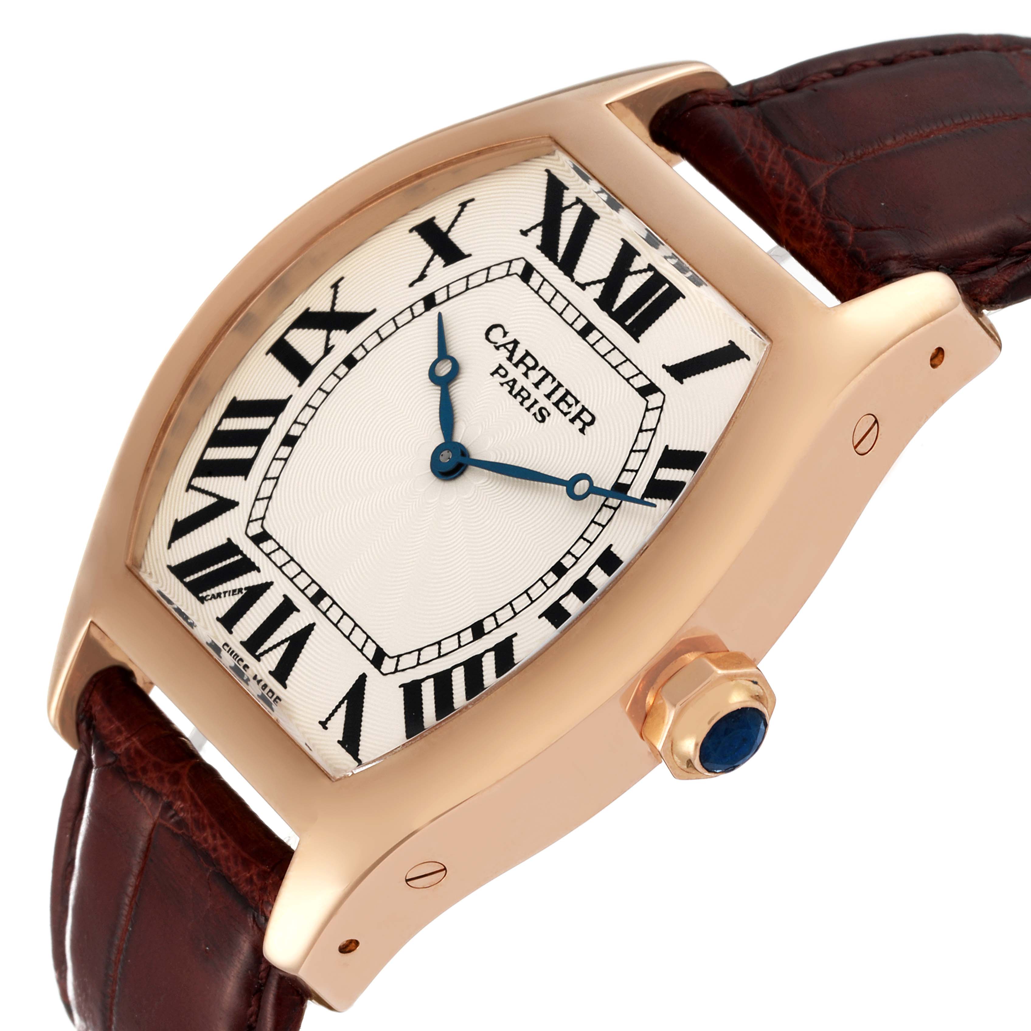 The image shows a close-up, angled view of the Cartier Tortue W1546051 Men's Rose Gold Silver Dial W1546051 Men's Rose Gold Silver Dial watch face, case, crown, and part of the strap.