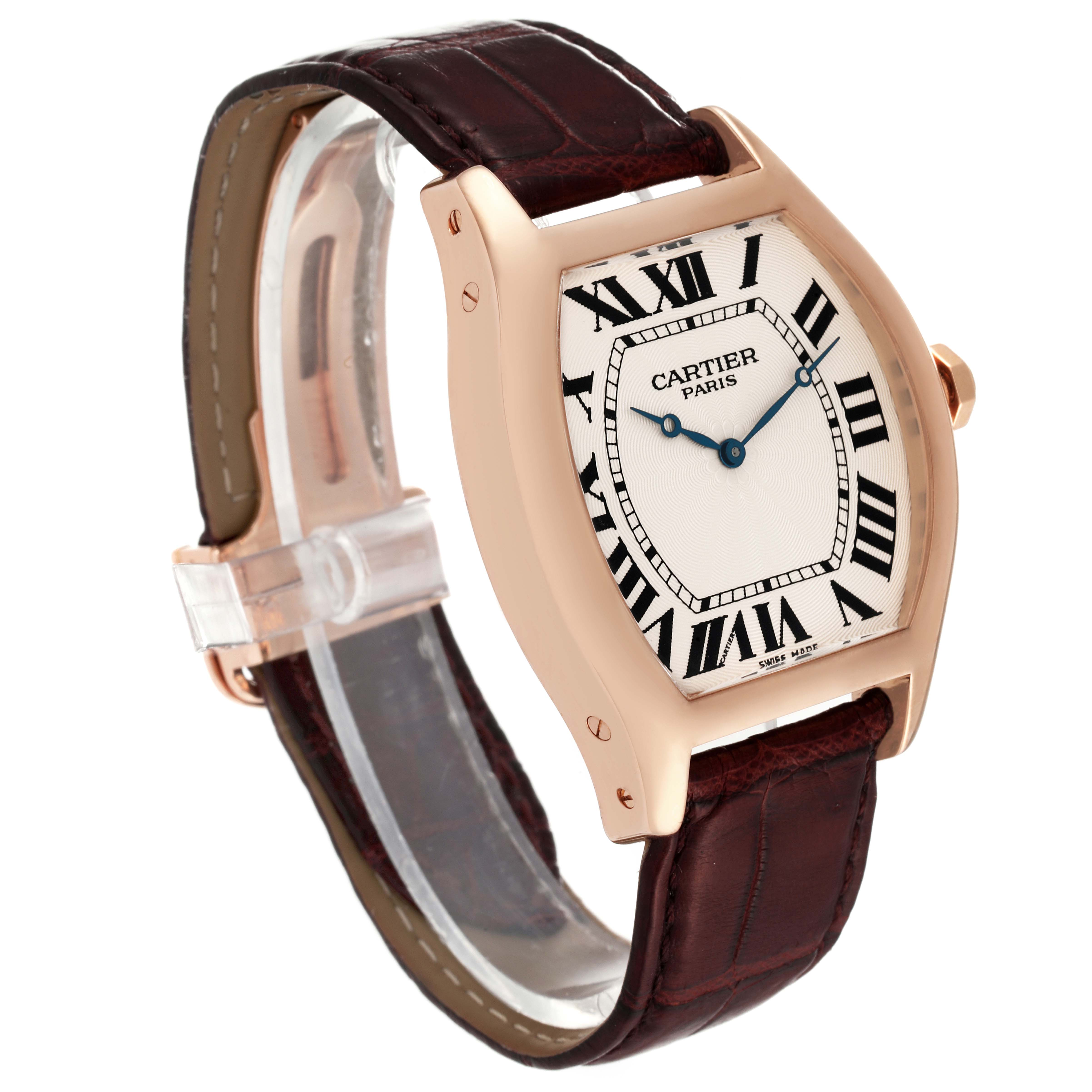 This is a side angle view of the Cartier Tortue W1546051 Men's Rose Gold Silver Dial W1546051 Men's Rose Gold Silver Dial watch showcasing the face, case, and part of the strap.
