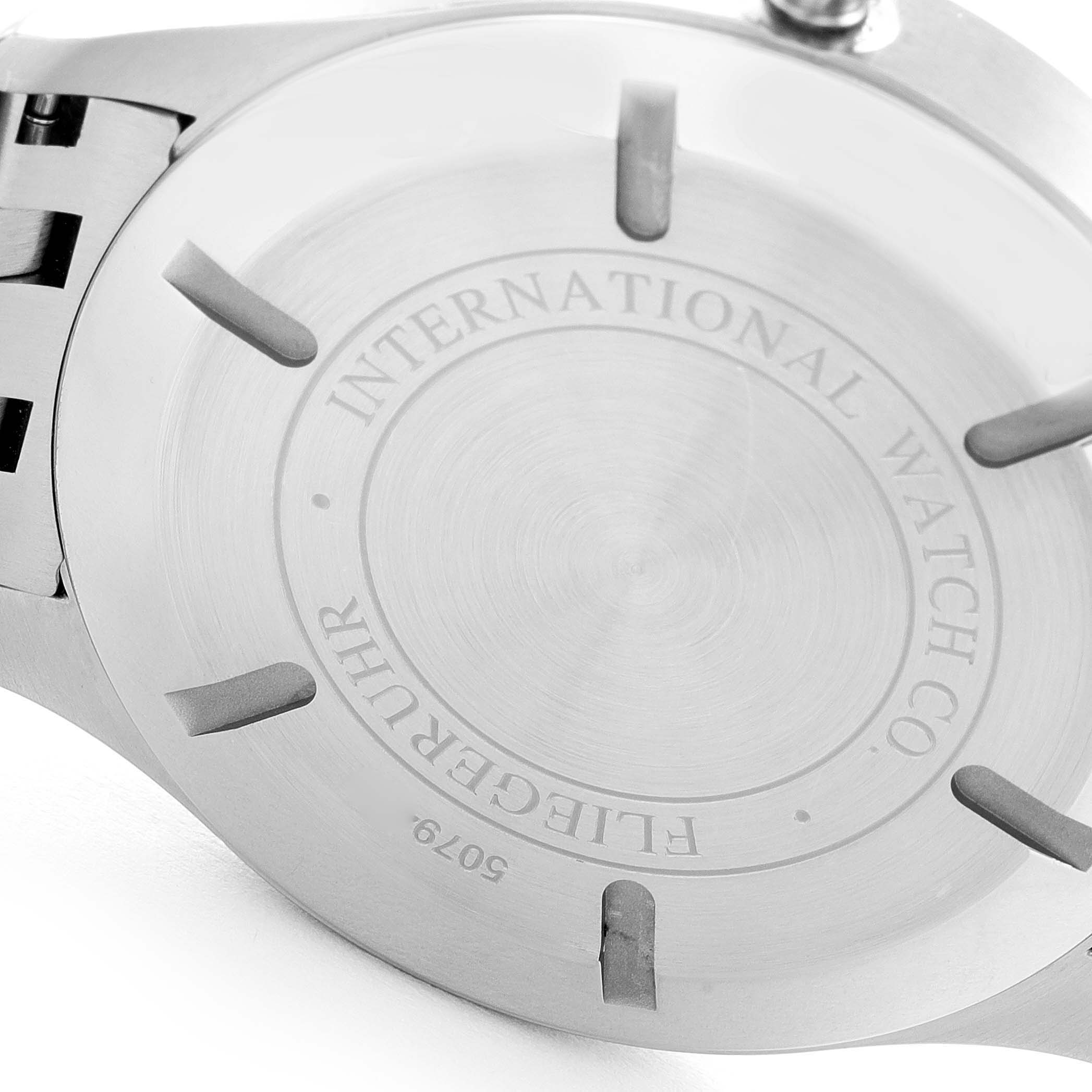 The image shows the back case of an IWC Pilot IW326504 Men's Stainless Steel Black Dial IW326504 Men's Stainless Steel Black Dial watch, displaying the brand's engraving.