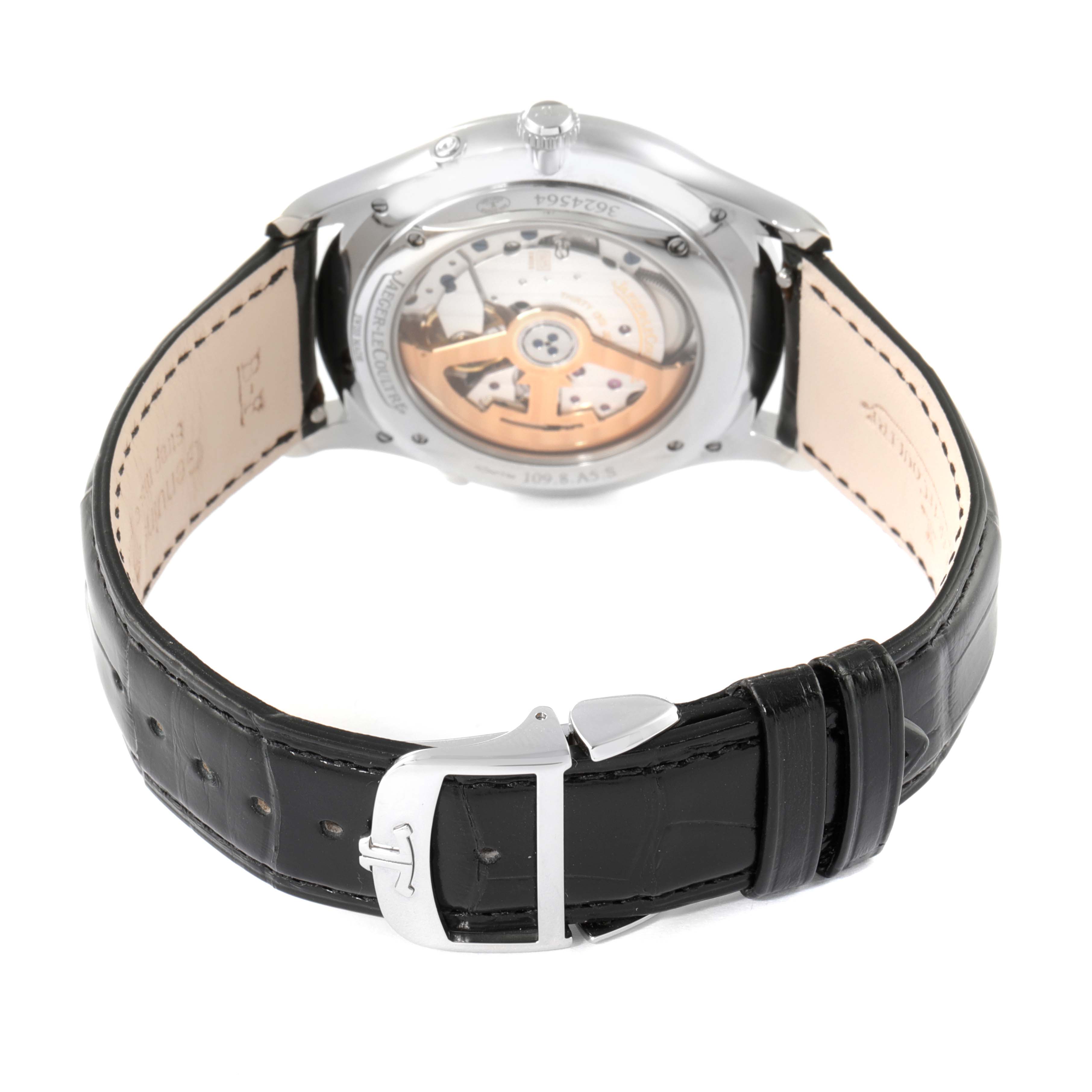 The image shows the back view of a Jaeger-LeCoultre Master model watch, featuring its open caseback and leather strap.