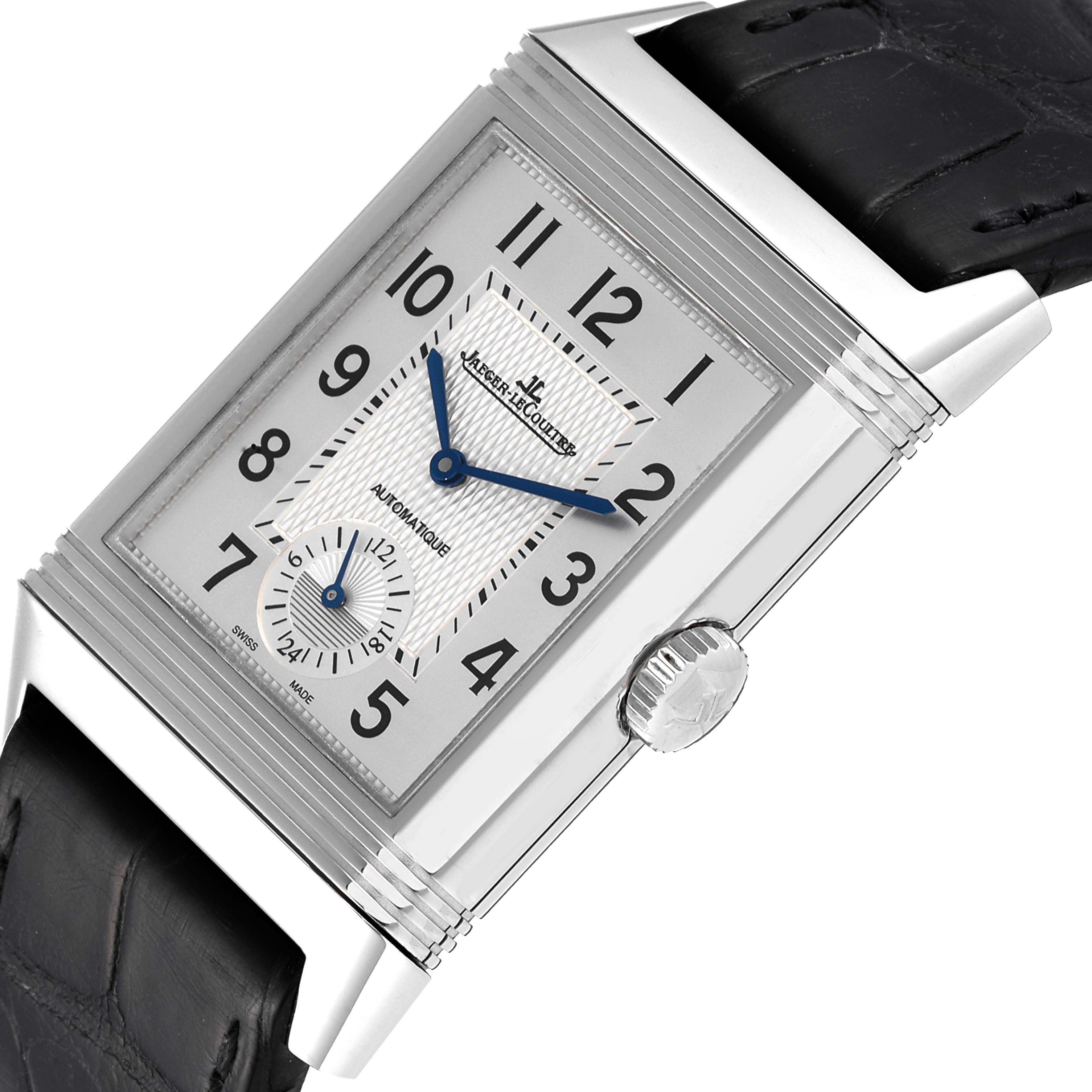 This image shows a close-up of the Jaeger LeCoultre Reverso Q3838420 Men
s Stainless Steel Silver Dial Q3838420 Men
s Stainless Steel Silver Dial watch face and crown at an angle, highlighting its rectangular dial and leather strap.