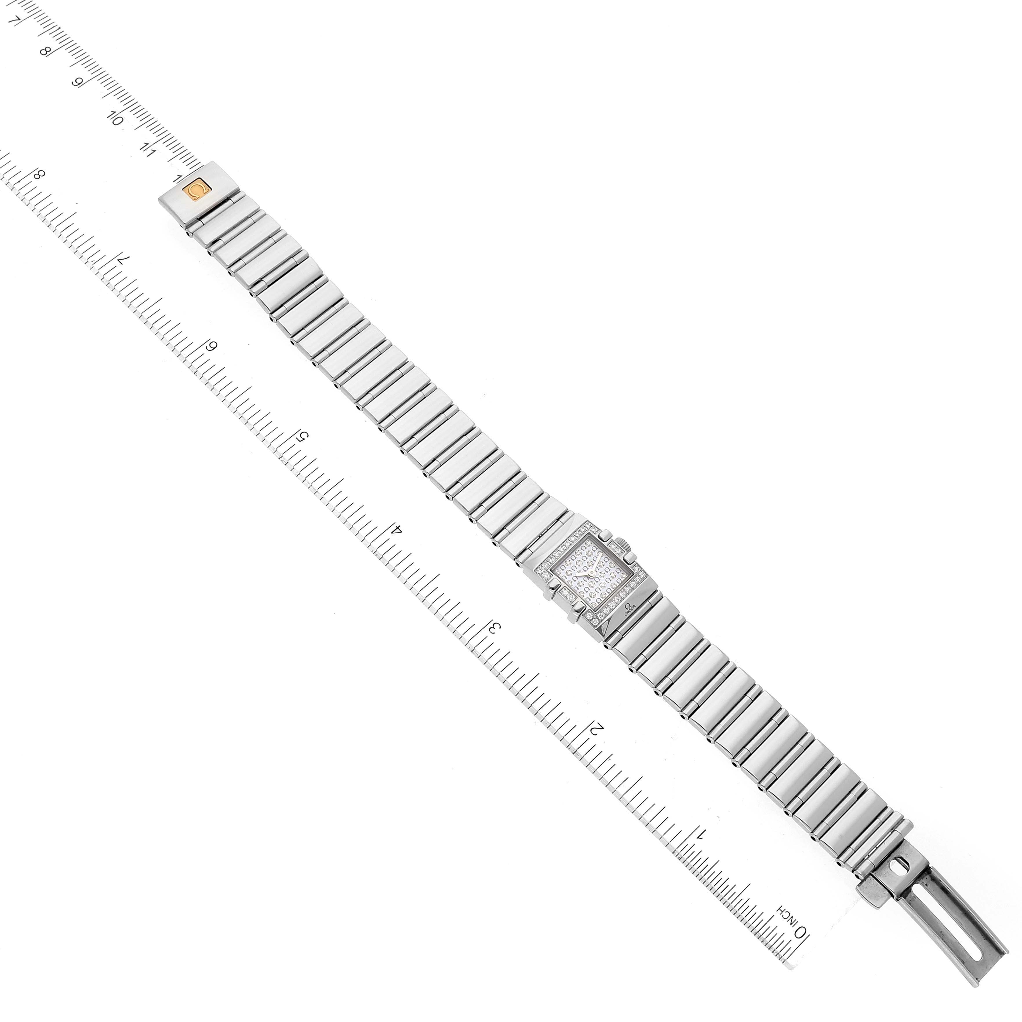 The Omega 1539.77.00 Women
s Stainless Steel Mother of Pearl Dial 1539.77.00 Women
s Stainless Steel Mother of Pearl Dial Constellation Quadra MOP Diamond Steel Ladies Watch 1539.77.00 is shown fully extended with a ruler for scale.