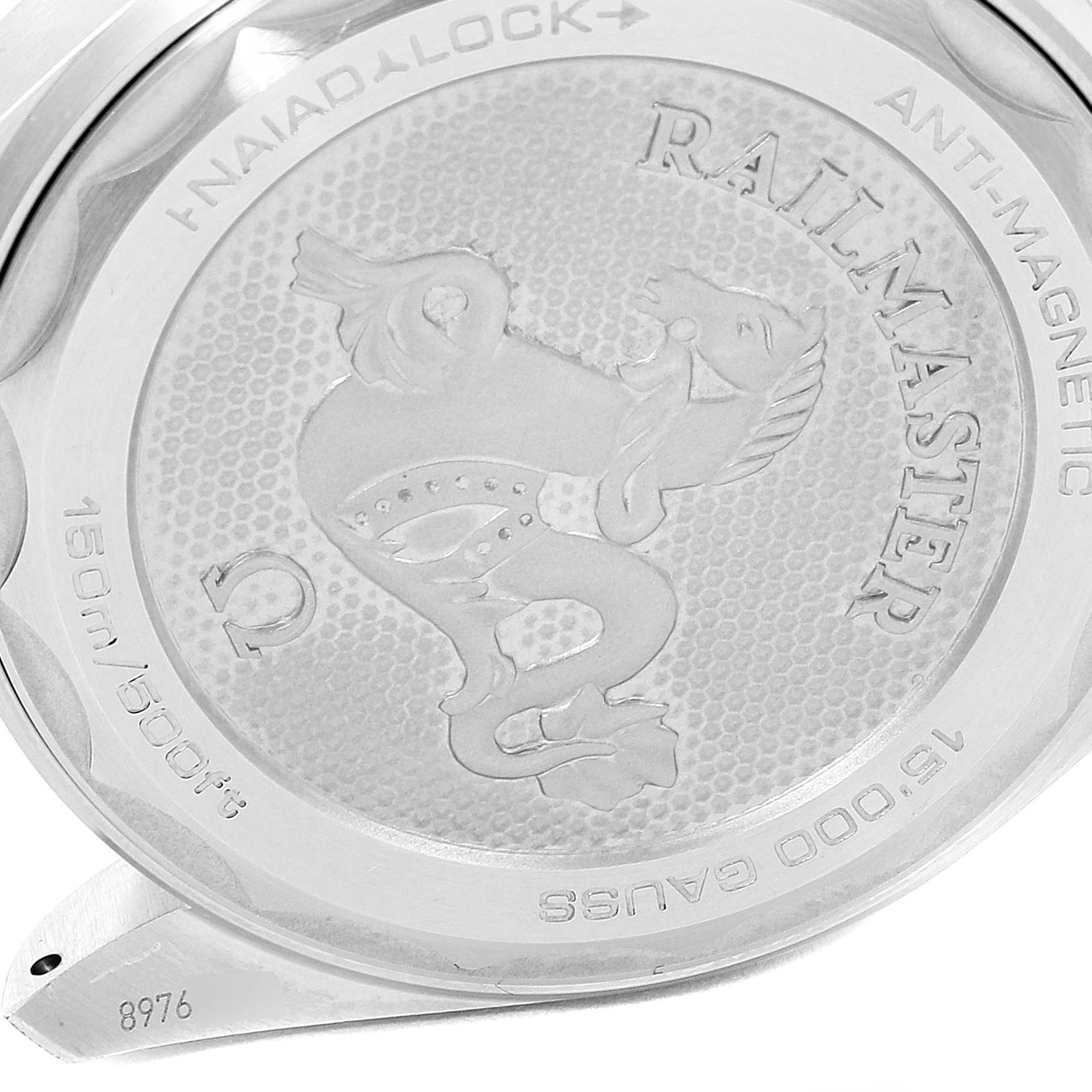 This image shows the case back of an Omega Seamaster 220.10.40.20.03.001 Men
s Stainless Steel Blue Dial 220.10.40.20.03.001 Men
s Stainless Steel Blue Dial Railmaster watch featuring engraved details and text.