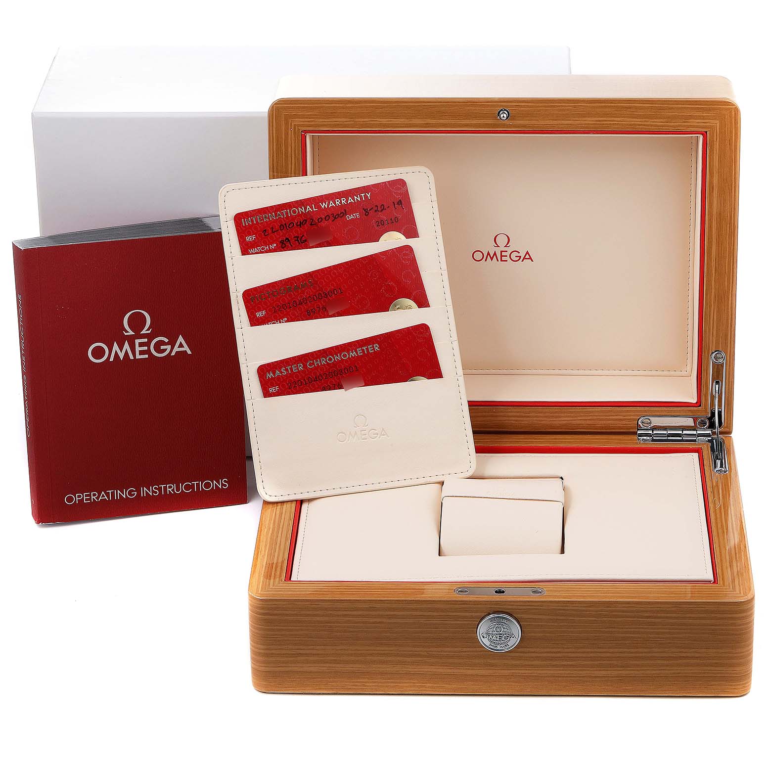 The image shows an open Omega Seamaster 220.10.40.20.03.001 Men
s Stainless Steel Blue Dial 220.10.40.20.03.001 Men
s Stainless Steel Blue Dial watch box, operating instructions, and warranty cards.