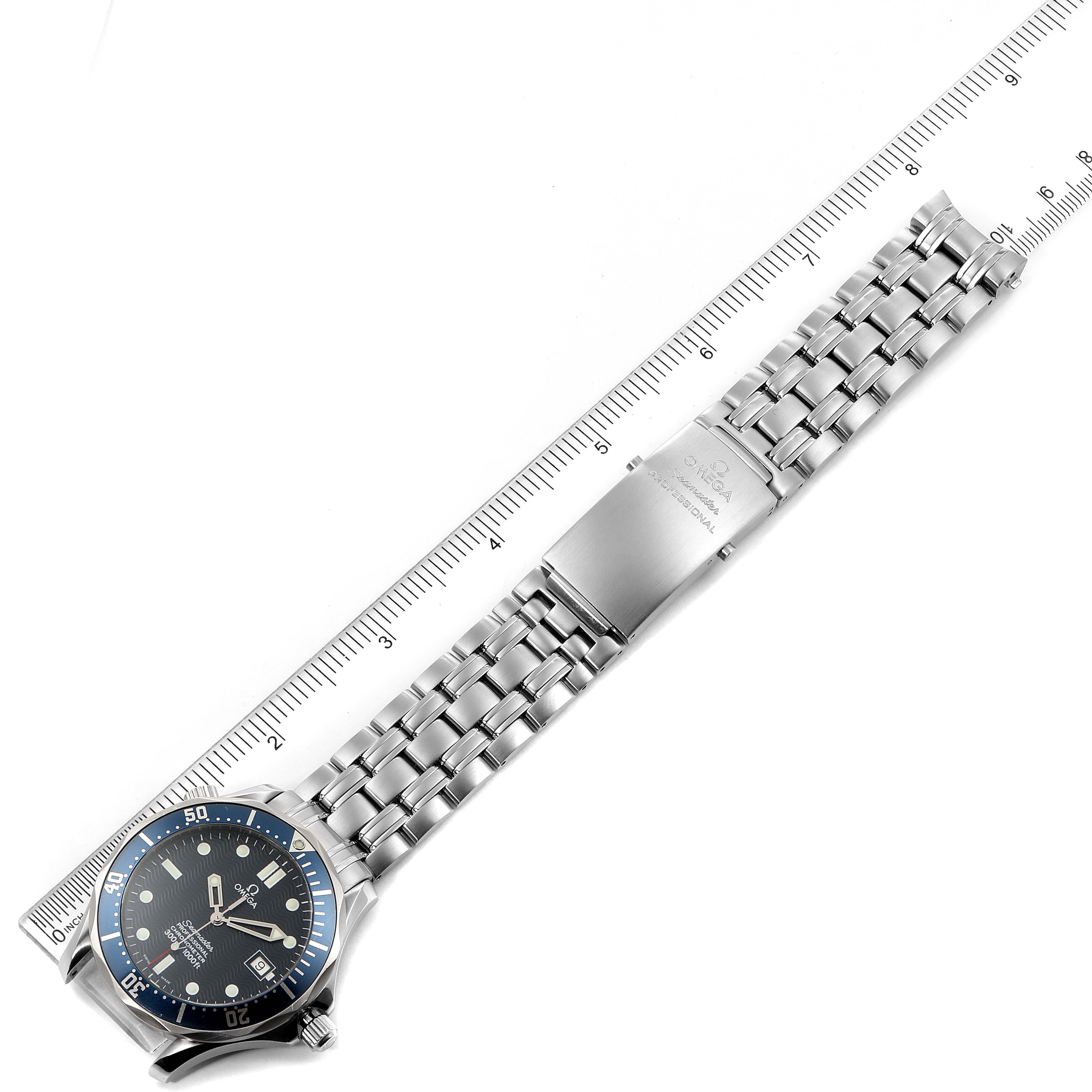The image shows the Omega Seamaster 2531.80.00 Men
s Stainless Steel Blue Dial 2531.80.00 Men
s Stainless Steel Blue Dial watch laid flat with a metal bracelet, viewed from above alongside a ruler for scale.