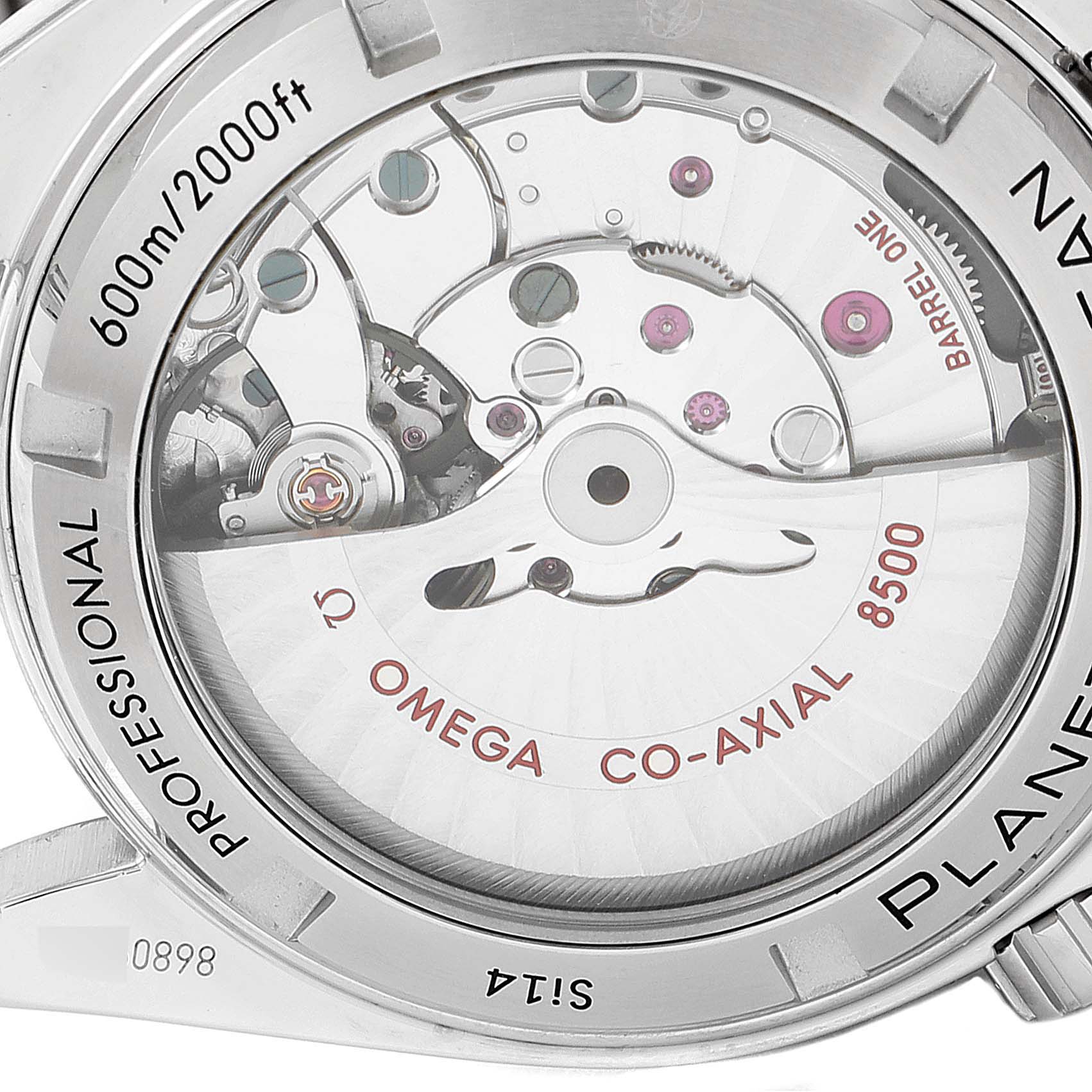 The image shows the exposed case back of an Omega Planet Ocean 232.30.38.20.01.002 Men
s Stainless Steel Black Dial 232.30.38.20.01.002 Men
s Stainless Steel Black Dial 600m Professional revealing its Co-Axial 8500 movement.