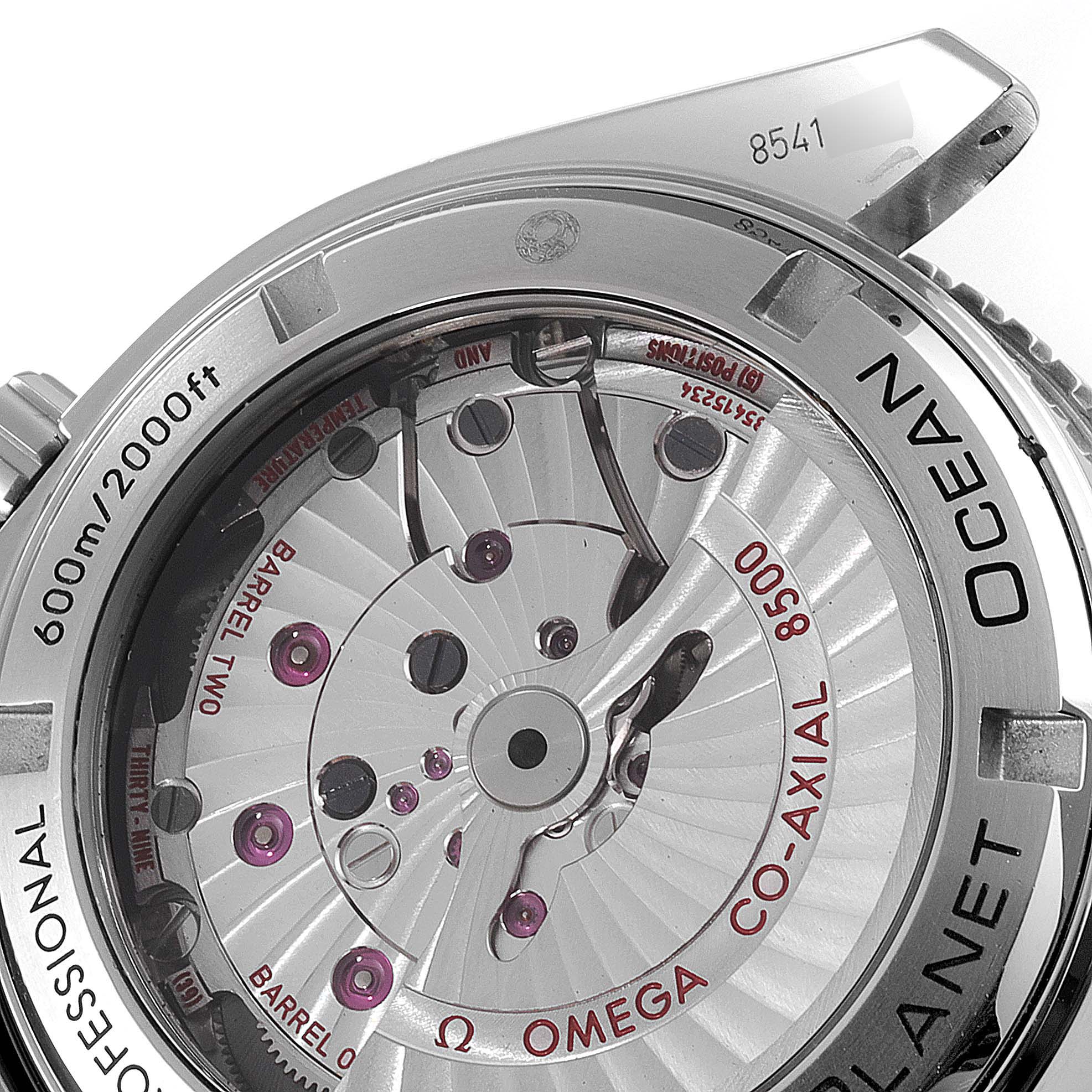 The image shows the back view of an Omega Planet Ocean 232.30.42.21.01.002 Men's Stainless Steel Black Dial 232.30.42.21.01.002 Men's Stainless Steel Black Dial watch, highlighting its co-axial 8500 movement.