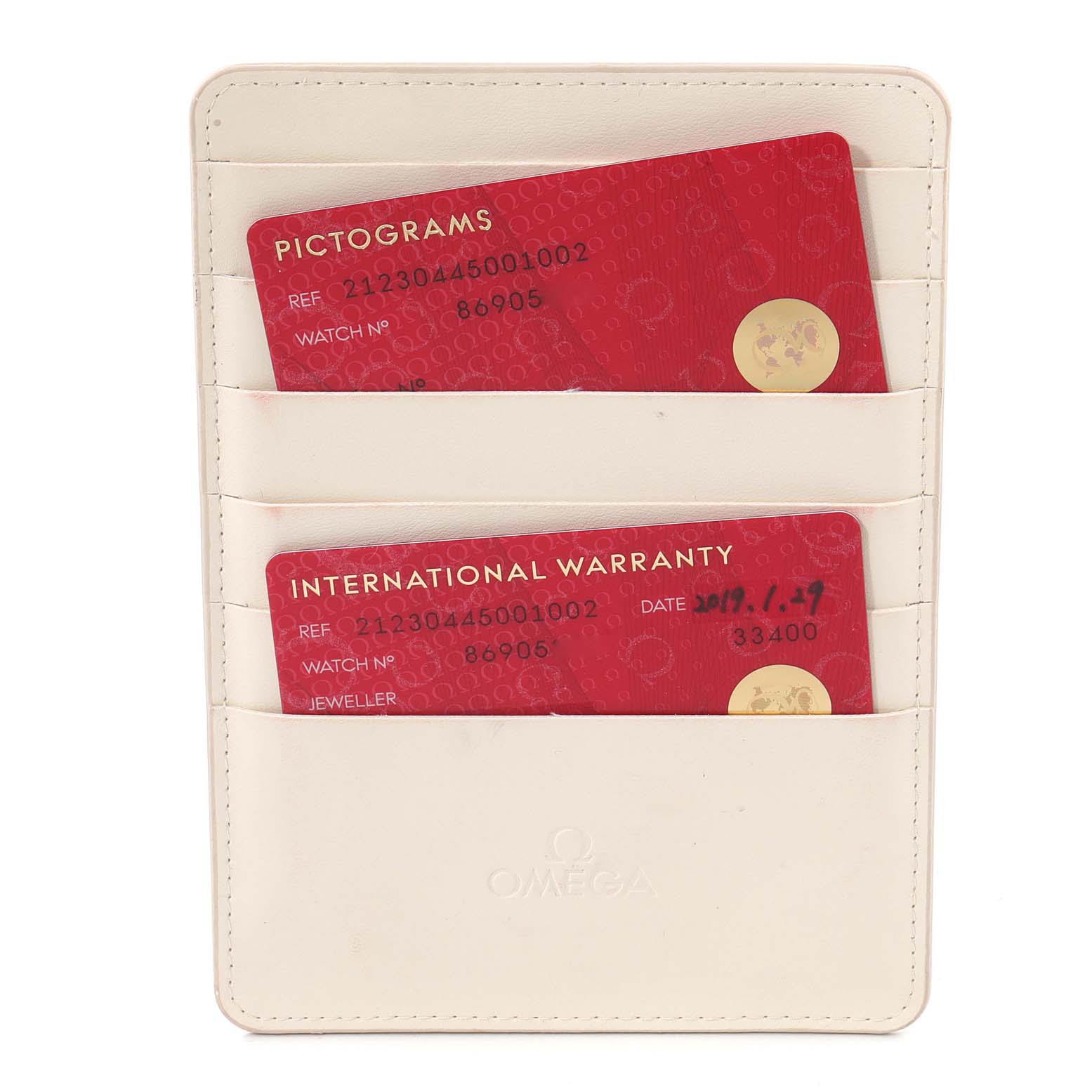 The image shows warranty cards for the Omega Seamaster 212.30.44.50.01.002 Men's Stainless Steel Black Dial 212.30.44.50.01.002 Men's Stainless Steel Black Dial in a white card holder.