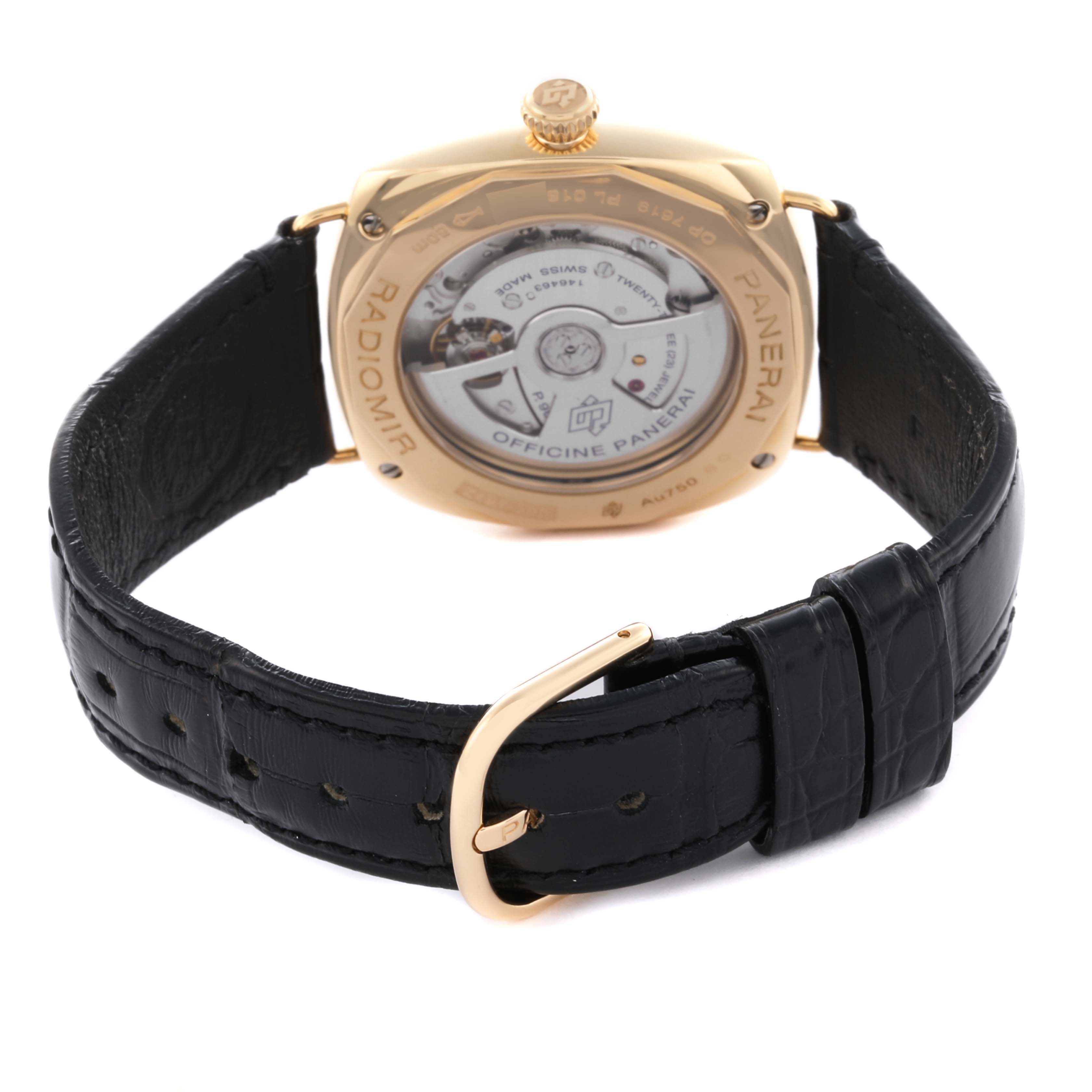 The image shows the back view of a Panerai Radiomir PAM01437 Men's Yellow Gold Green Dial PAM01437 Men's Yellow Gold Green Dial watch, highlighting its movement and black leather strap.