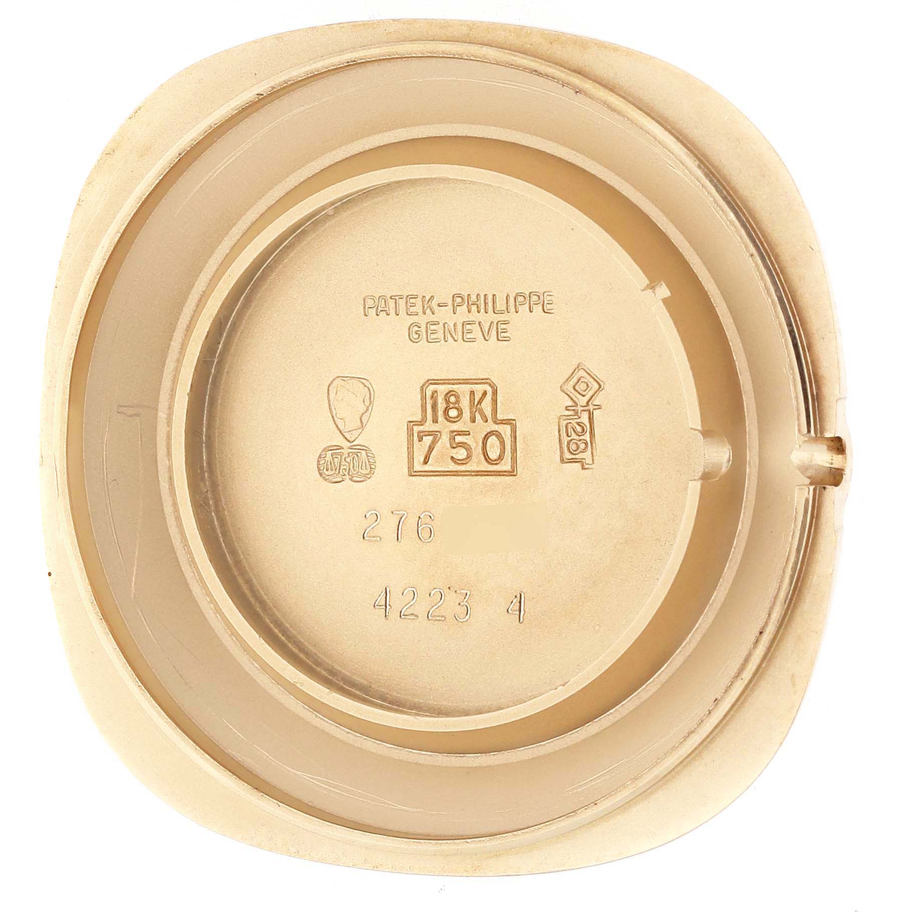 The image shows the back case of a Patek Philippe Golden Ellipse 4223 Women's Yellow Gold Blue Dial 4223 Women's Yellow Gold Blue Dial watch, highlighting inscriptions and hallmarks.